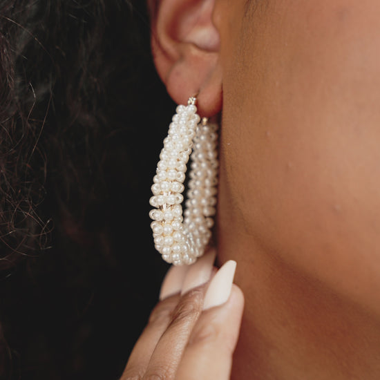 Classic Pearl Cluster Stud Earrings on model in video