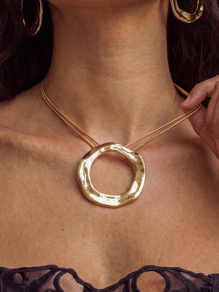 model in liquid metal earrings