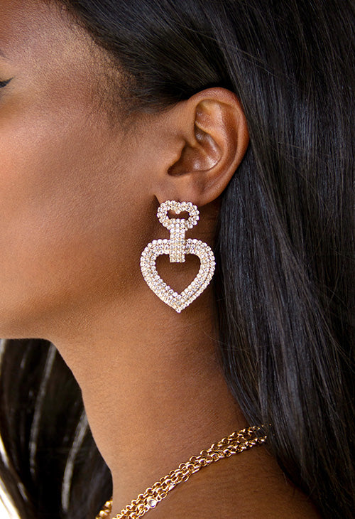 model in crystal statement heart earrings