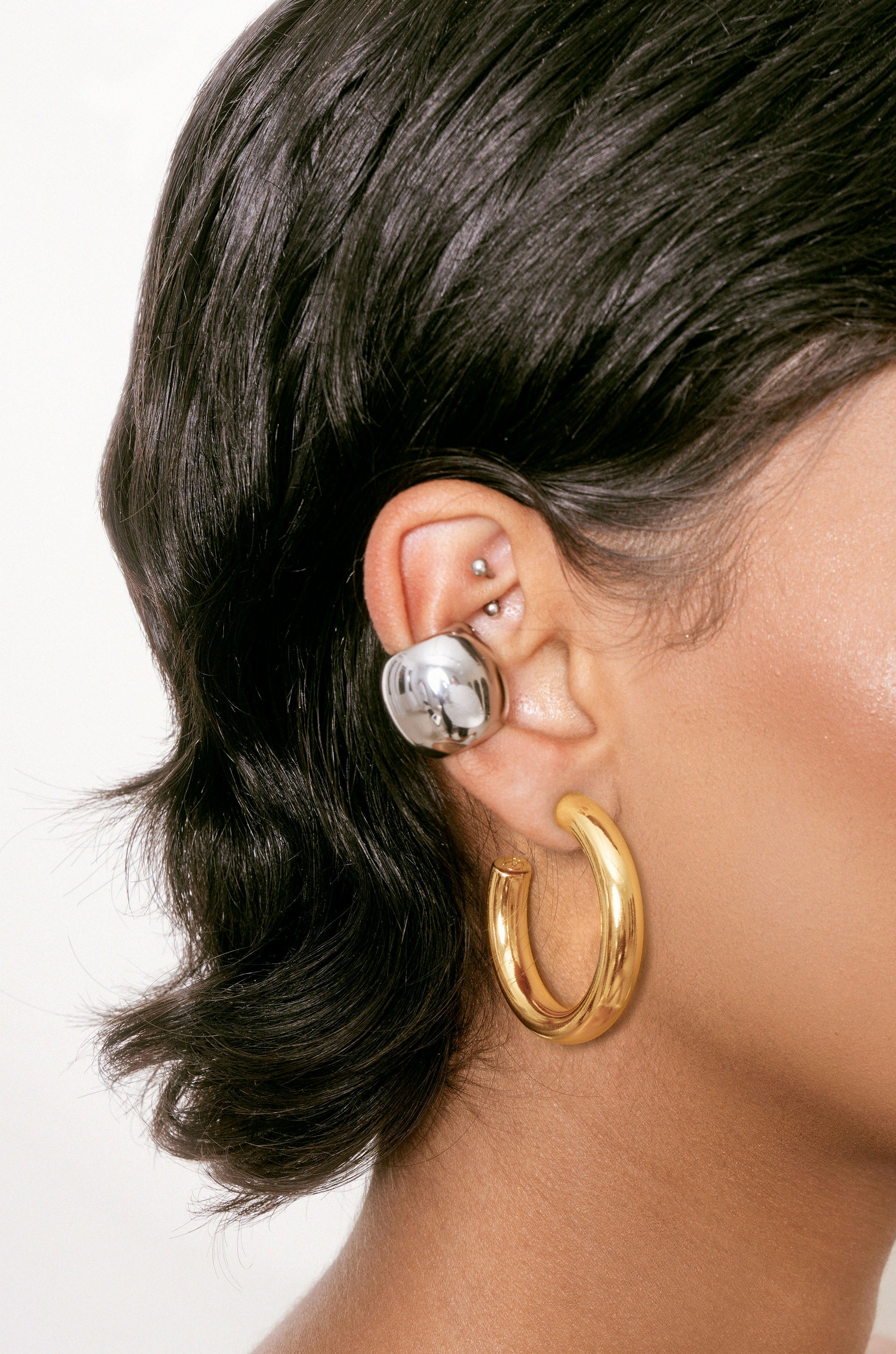 Thick Medium Hoops (1.5") and Chunky Cuff Set in rhodium and gold on model