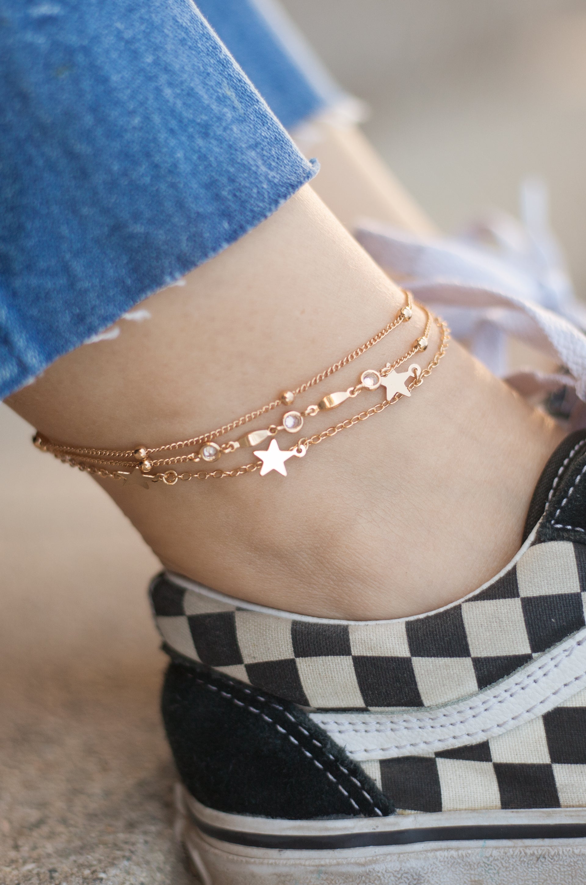 Crystal Star Searcher Charm Anklet shown on a model