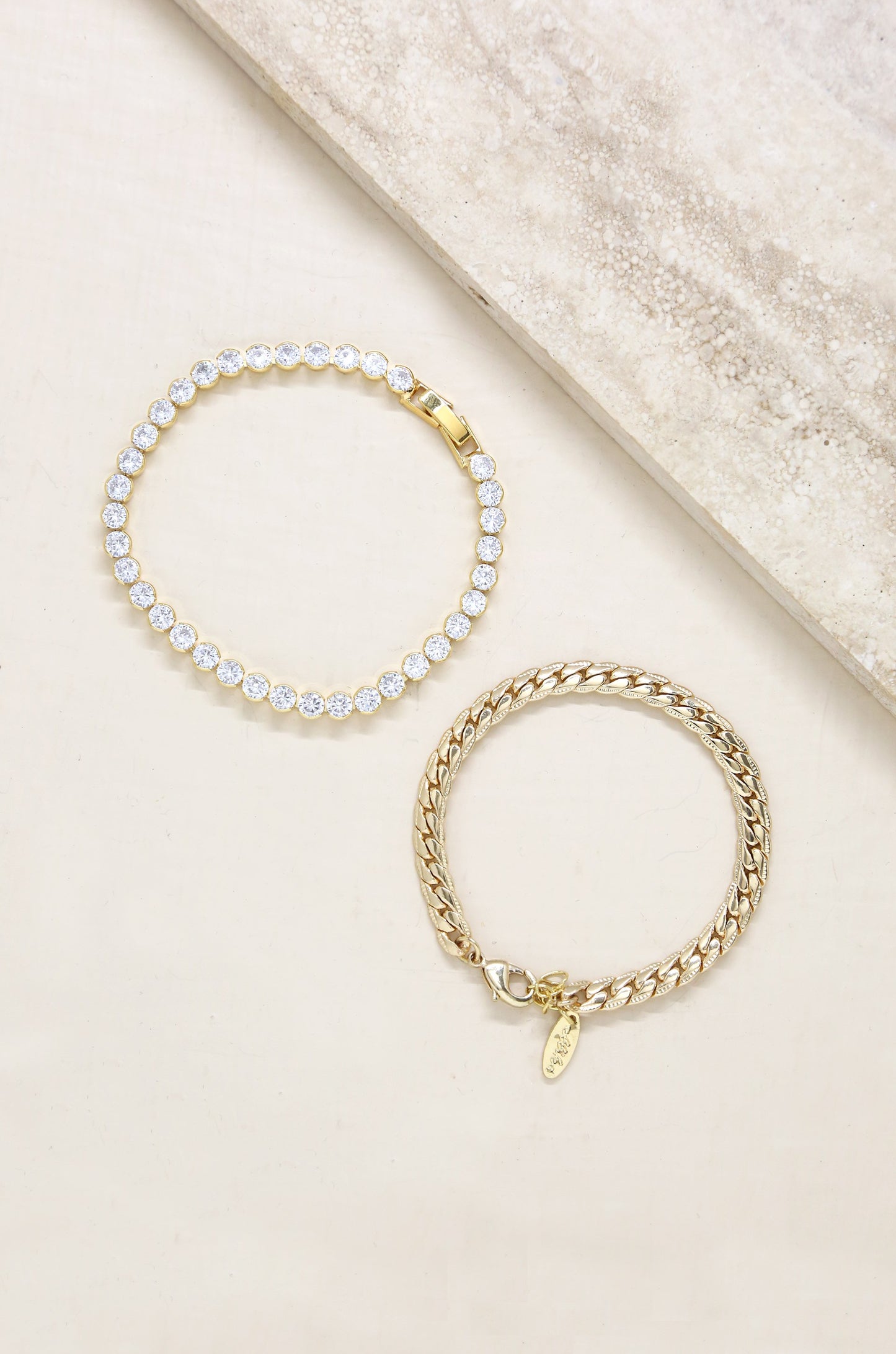 Crystal Chain & 18k Gold Plated Link Bracelet Set on slate background  