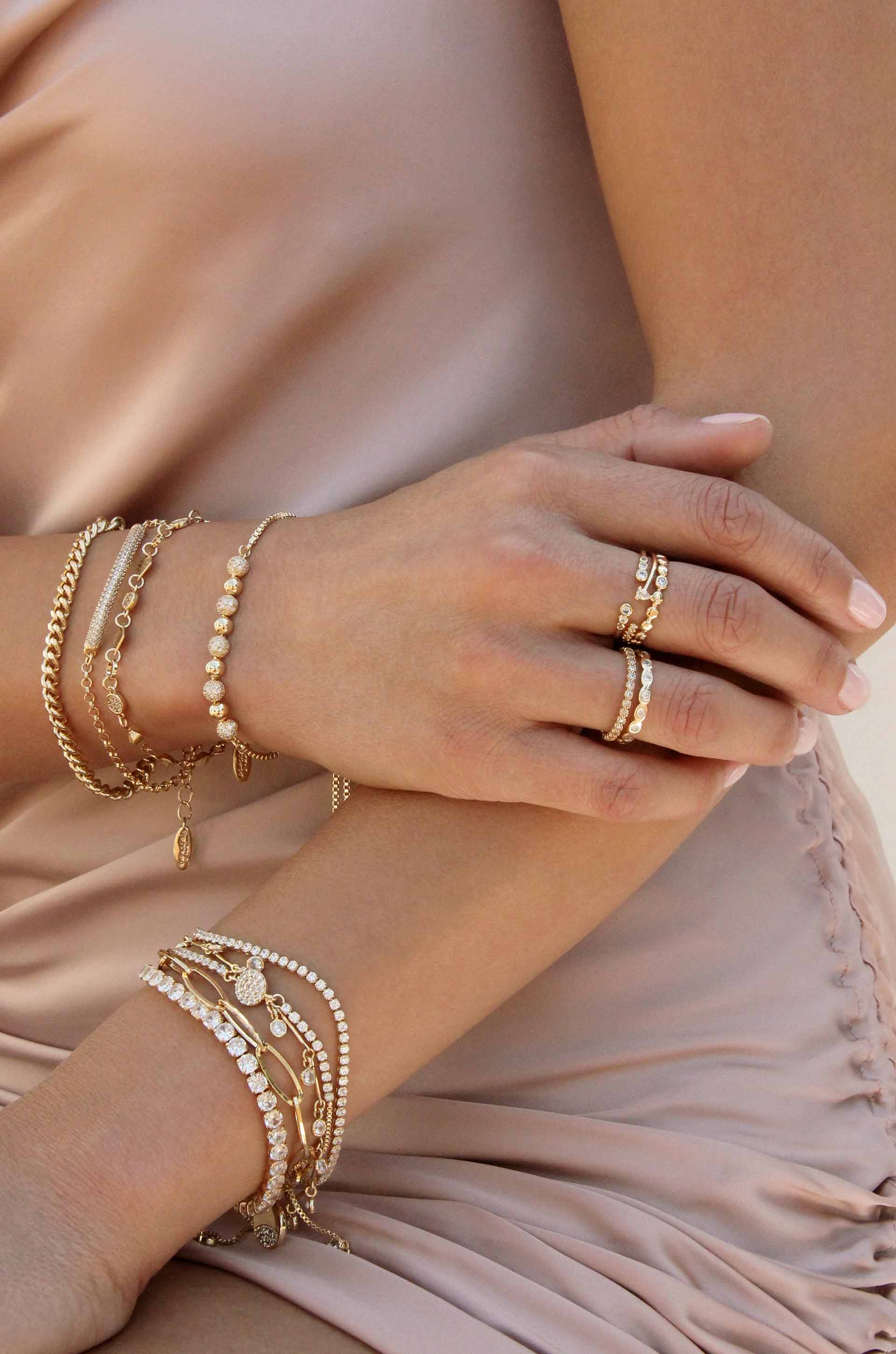Subtle Statements 18k Gold Plated Bracelet shown on a model  