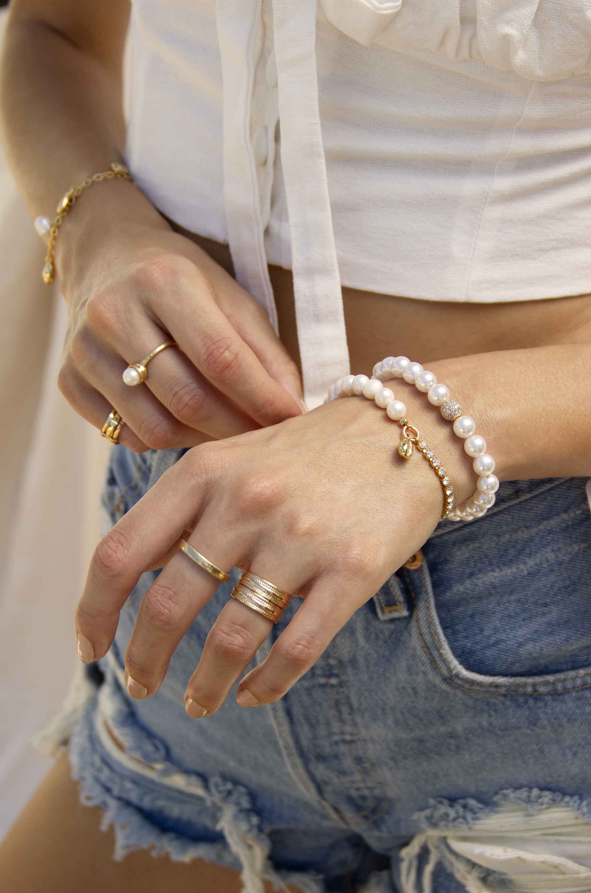 Pearl, Crystal, and Beach Shell 18k Gold Plated Bracelet on a model