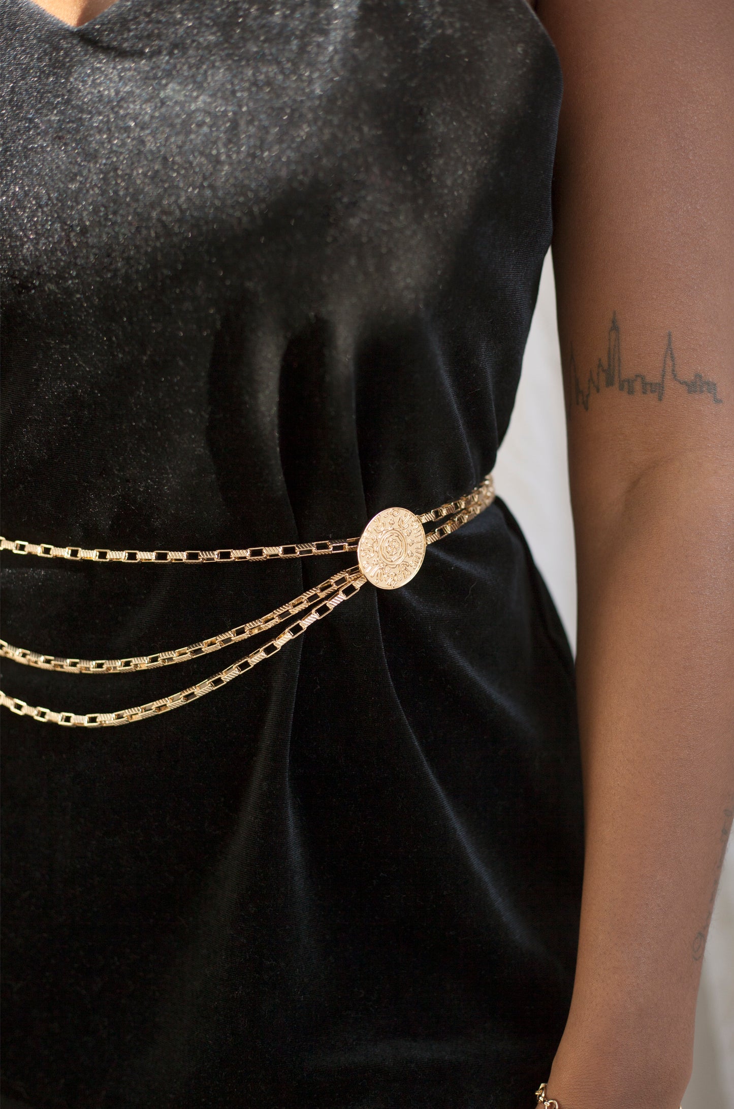 Multi-Chain Coin Dangle Belt in Gold shown on a model  2