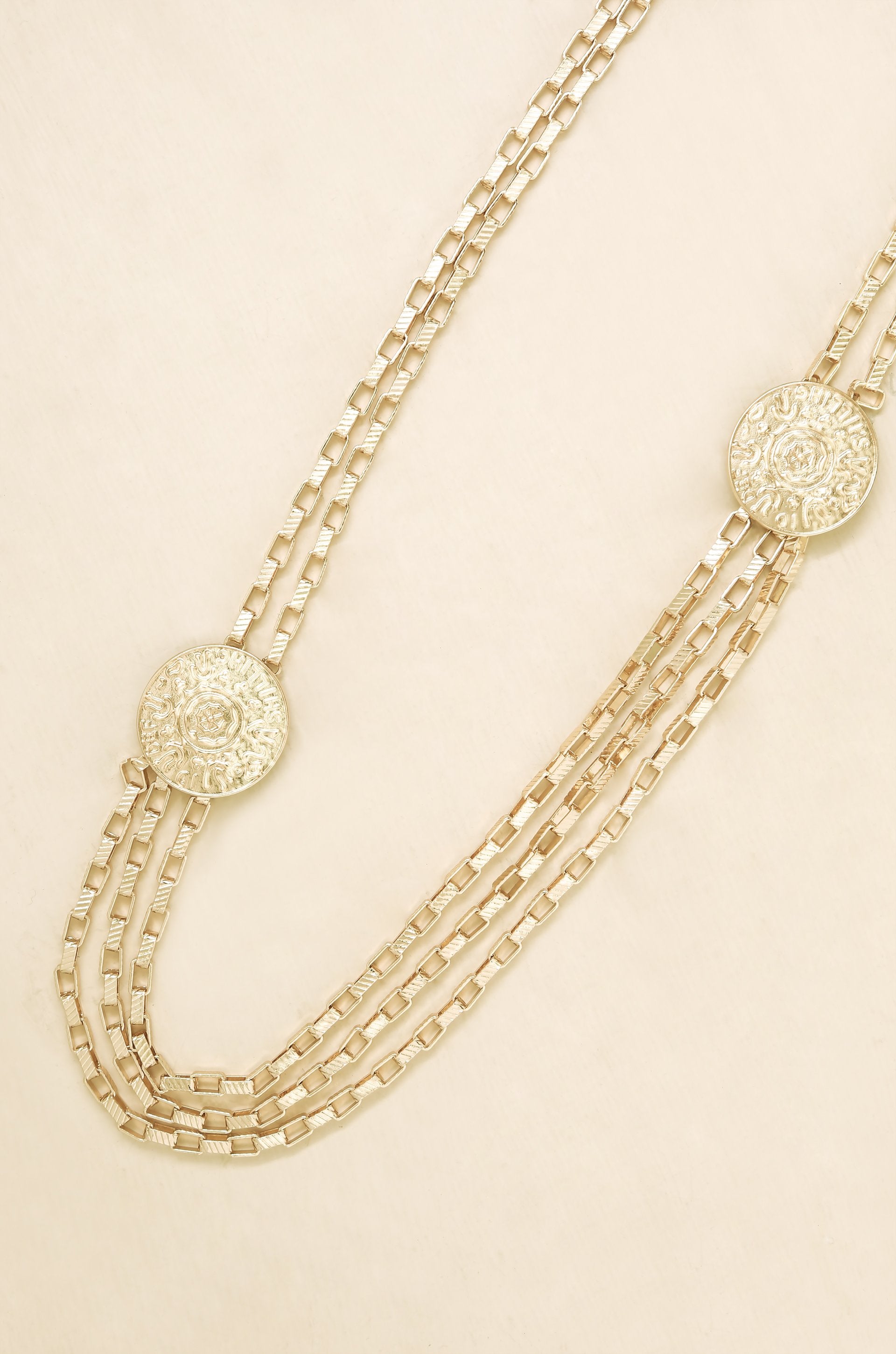 Multi-Chain Coin Dangle Belt in Gold on slate background  
