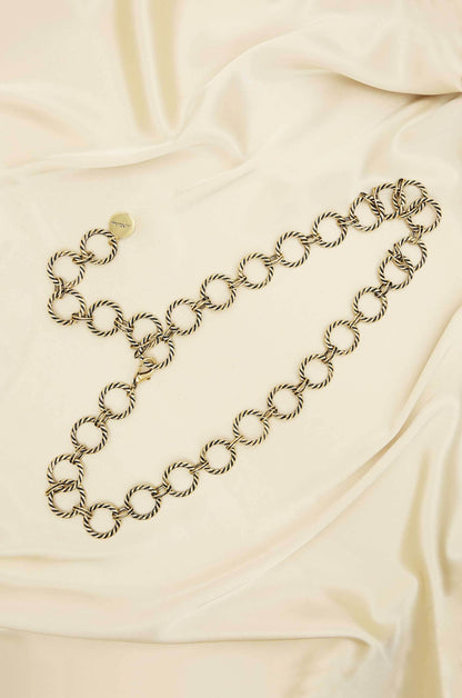 Loop It Through Belt in Antique Gold on slate background  