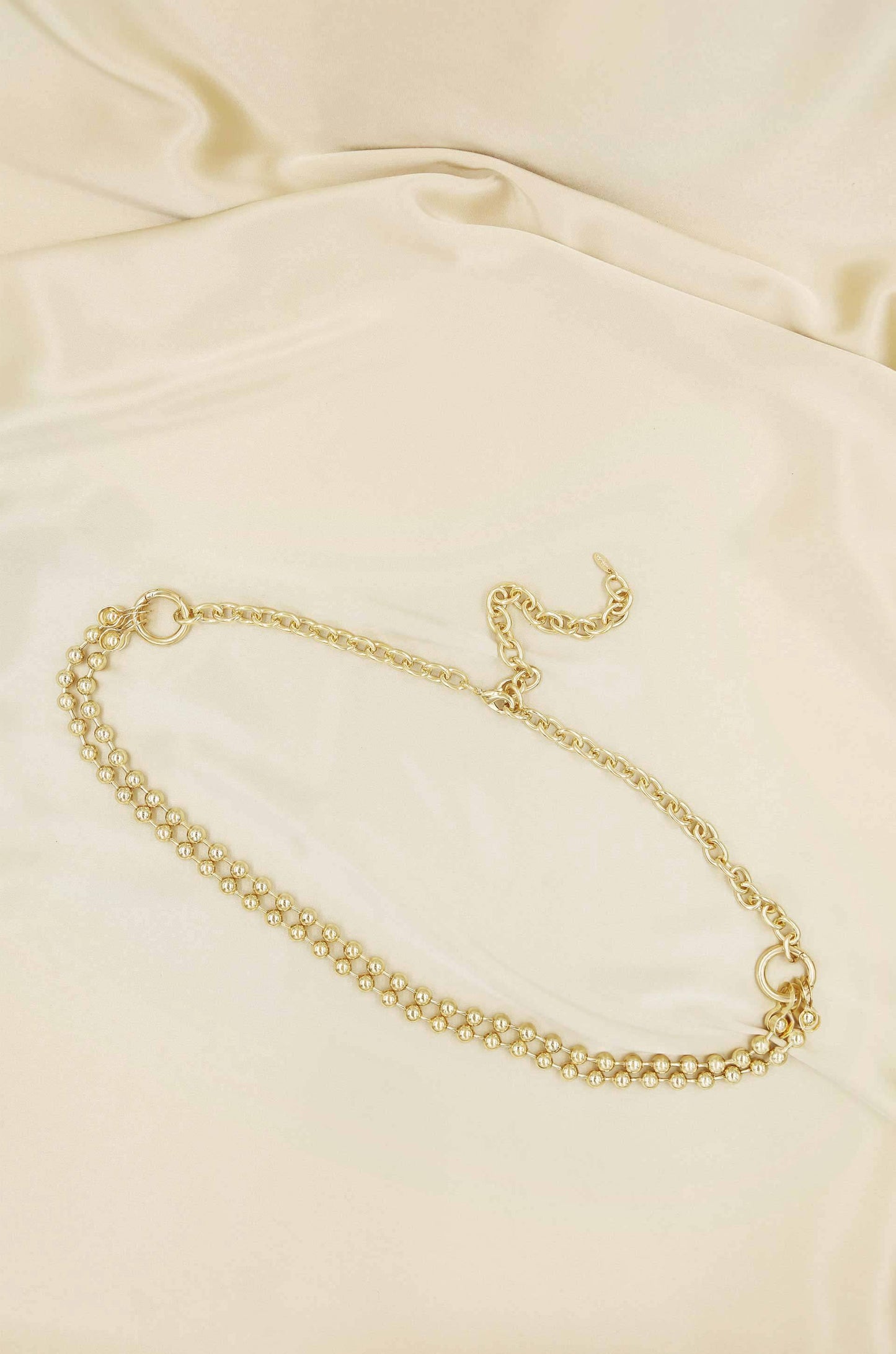 Double Ball Chain Gold Belt on slate background  