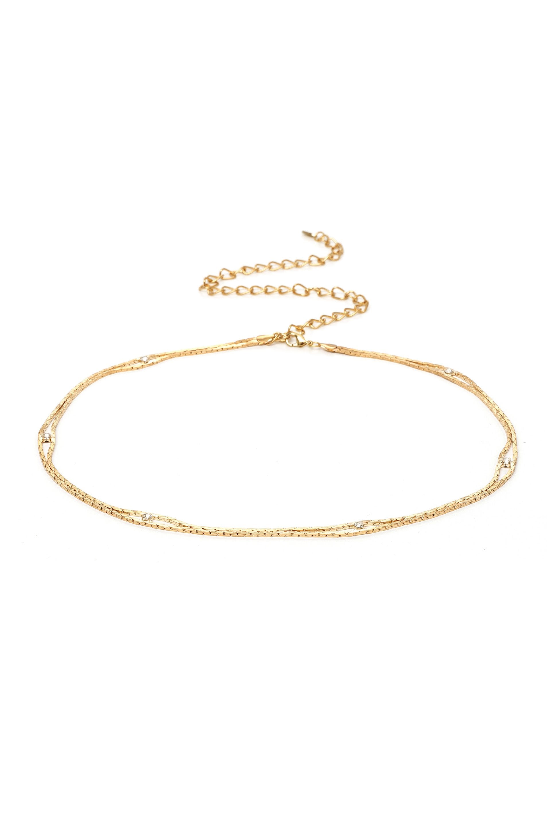 Always Relevant Gold Belt with Crystals on white background  