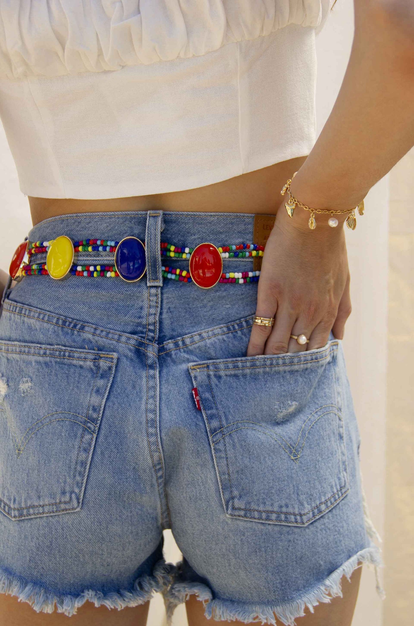 Mixed Rainbow Bead Belt in Gold on a model