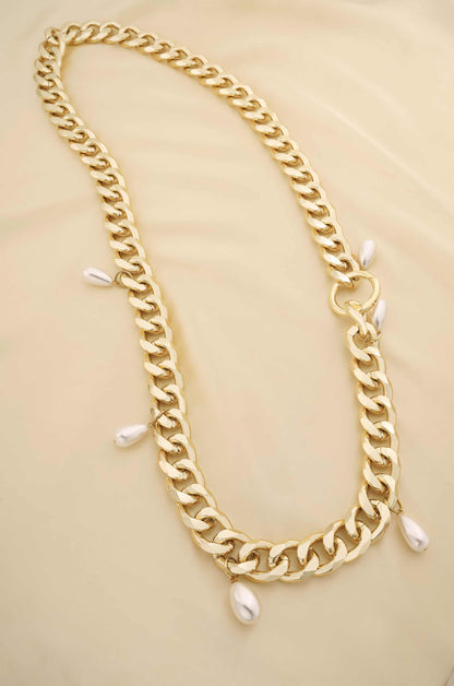 Pearl Dotted Chain Link Belt in Gold on slate background