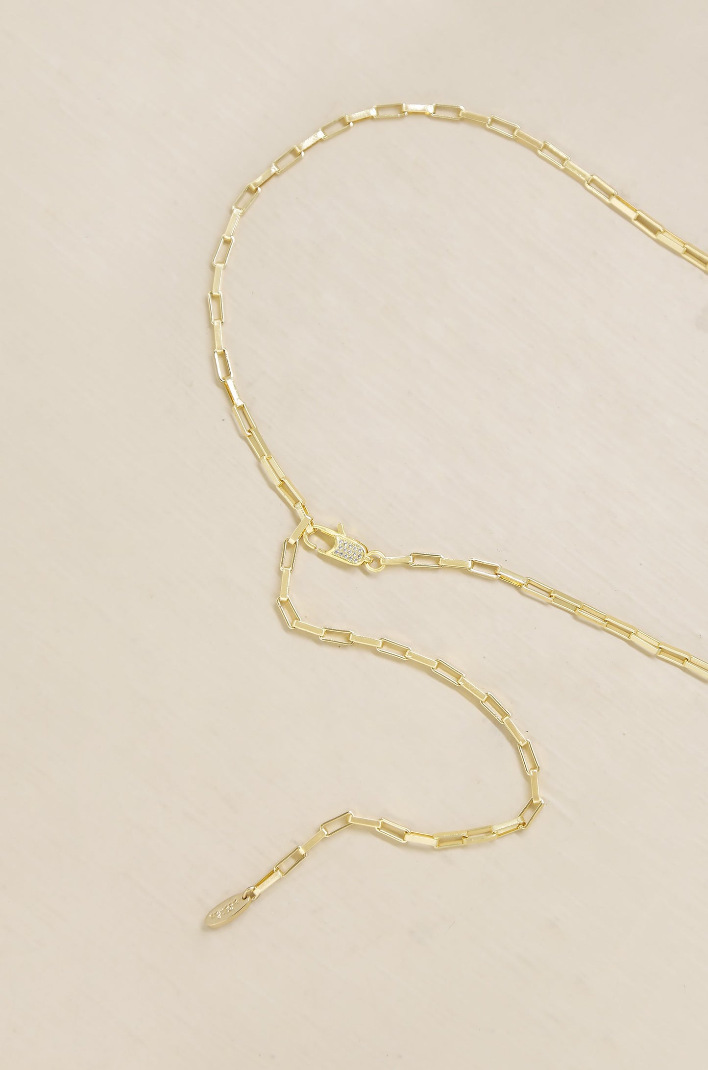 All Day Belt in Gold on slate background  