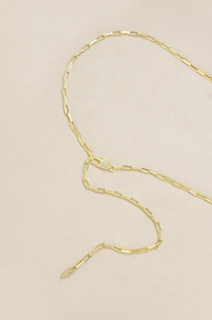 All Day Belt in Gold on slate background  