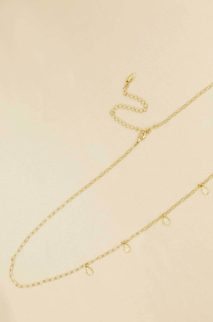 Delicate Crystal Droplet Gold Body Chain on slate background  