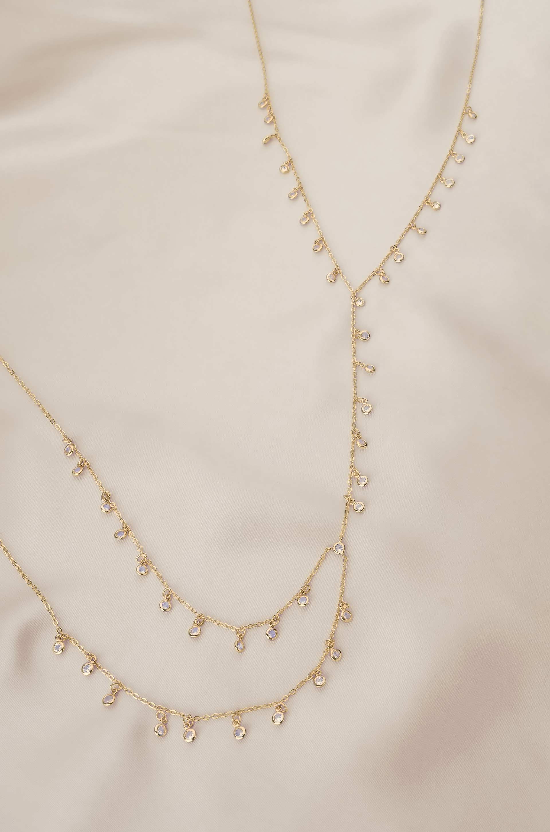 Crystal Fringe Body Chain in Gold on satin