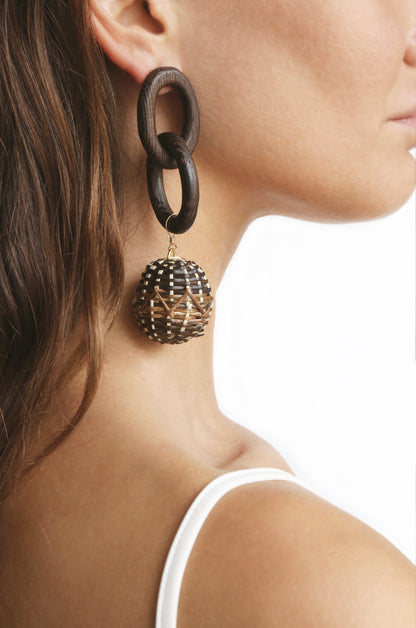 Nature Elements Earring in Wood and Gold shown on a model  