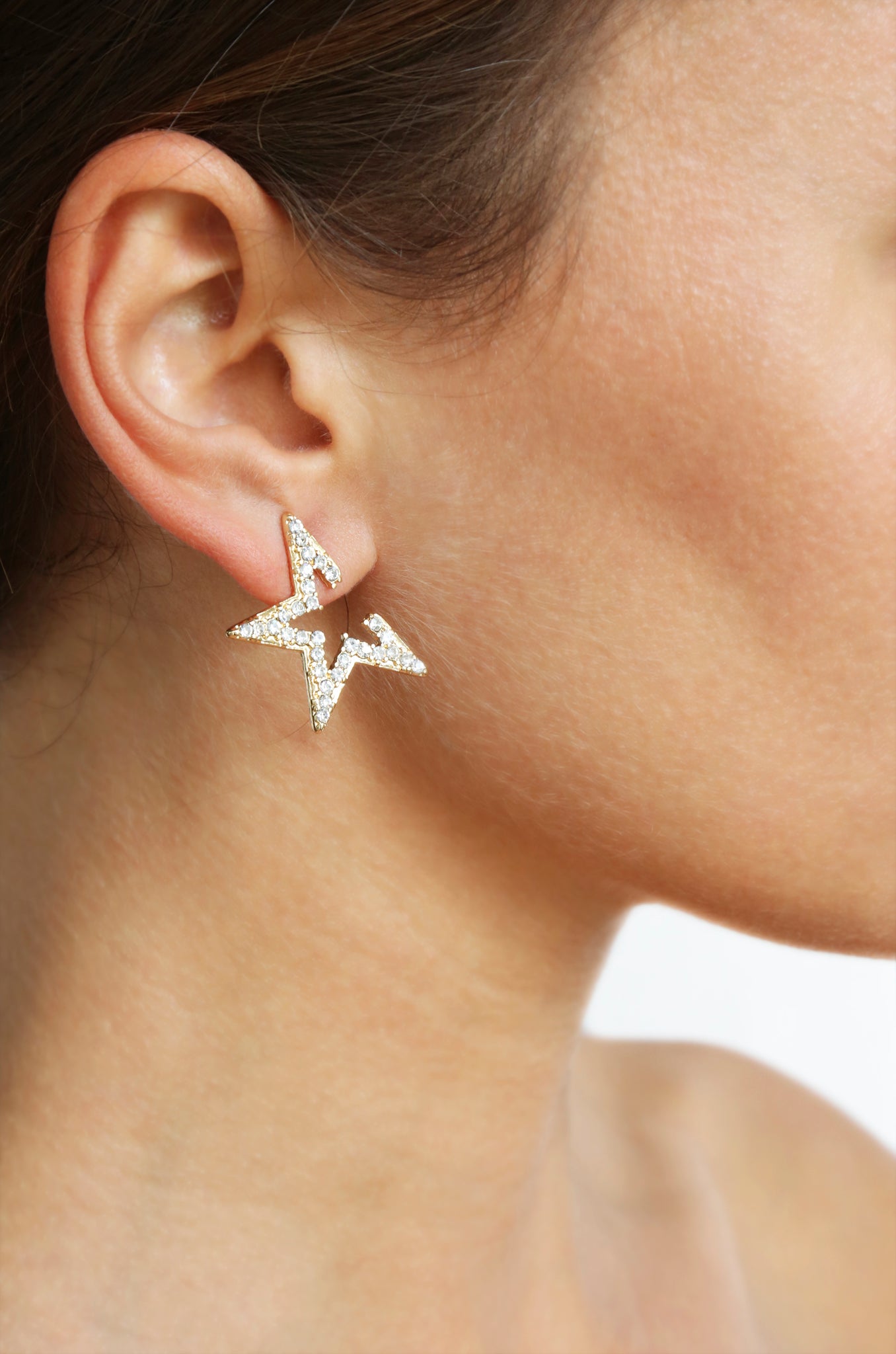 Star Light Crystal Statement Stud 18k Gold Plated Earrings shown on a model  