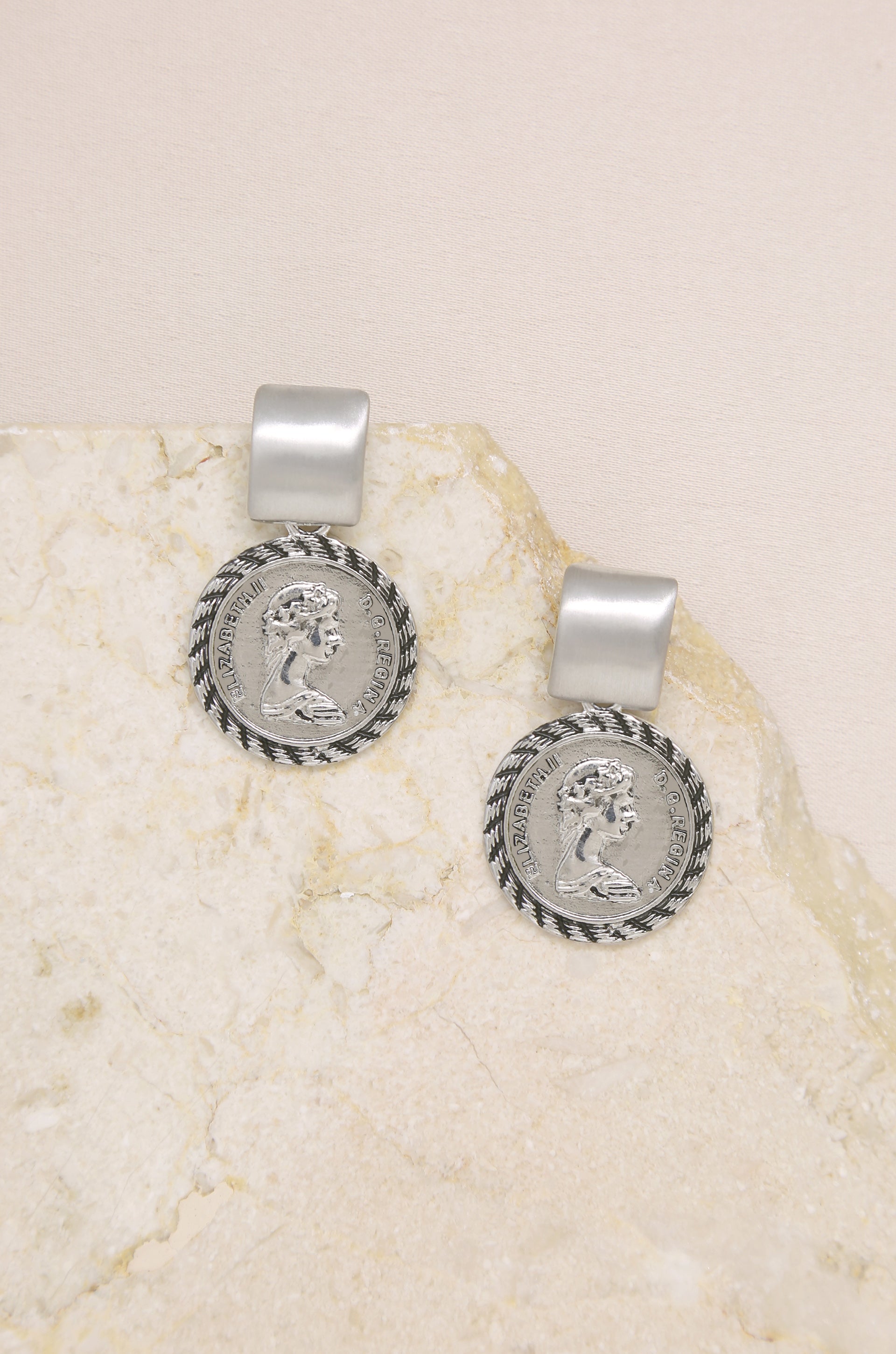 Mini Ancient Coin Earrings on slate background  