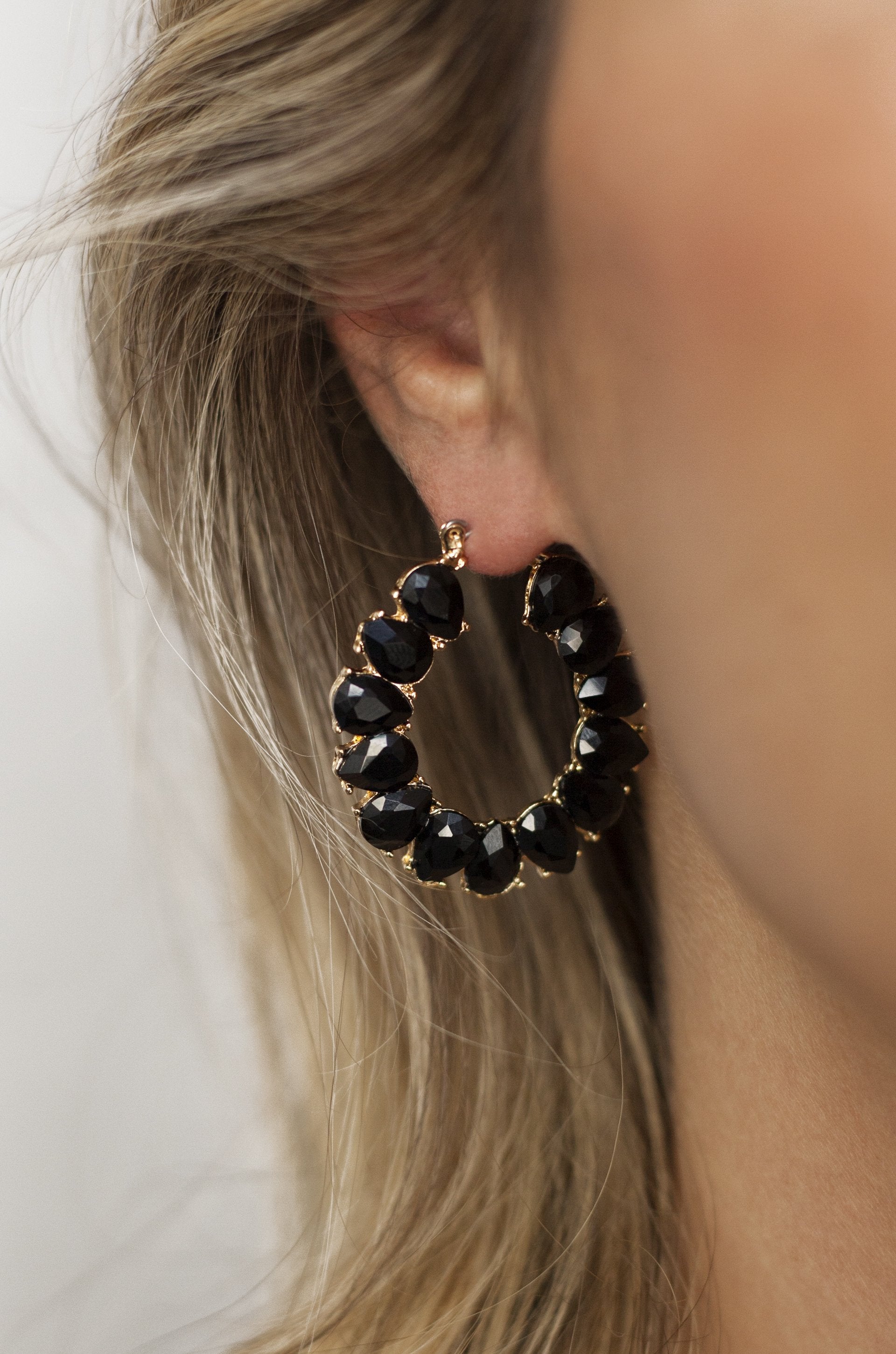 Black Statement Crystal Hoop 18k Gold Plated Earrings on a model