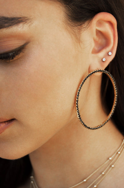 Picture Perfect Black Crystal Circle 18k Gold Plated Earrings on model