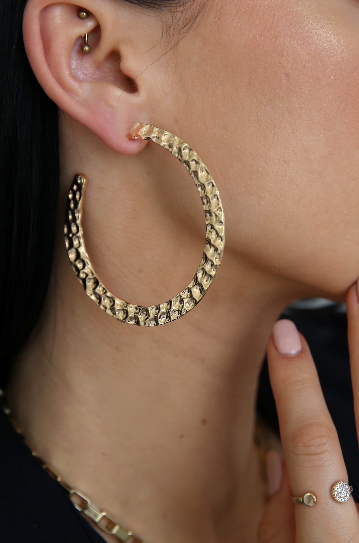 Hammered 18k Gold Plated Hoop Earrings  shown on a model  