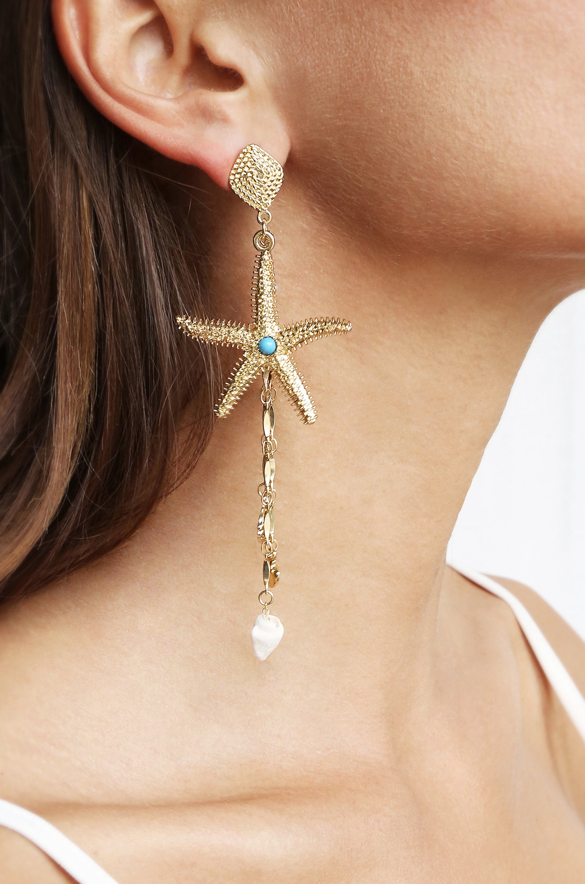 Starfish Seeker 18k Gold Plated Drop Earrings shown on a model  