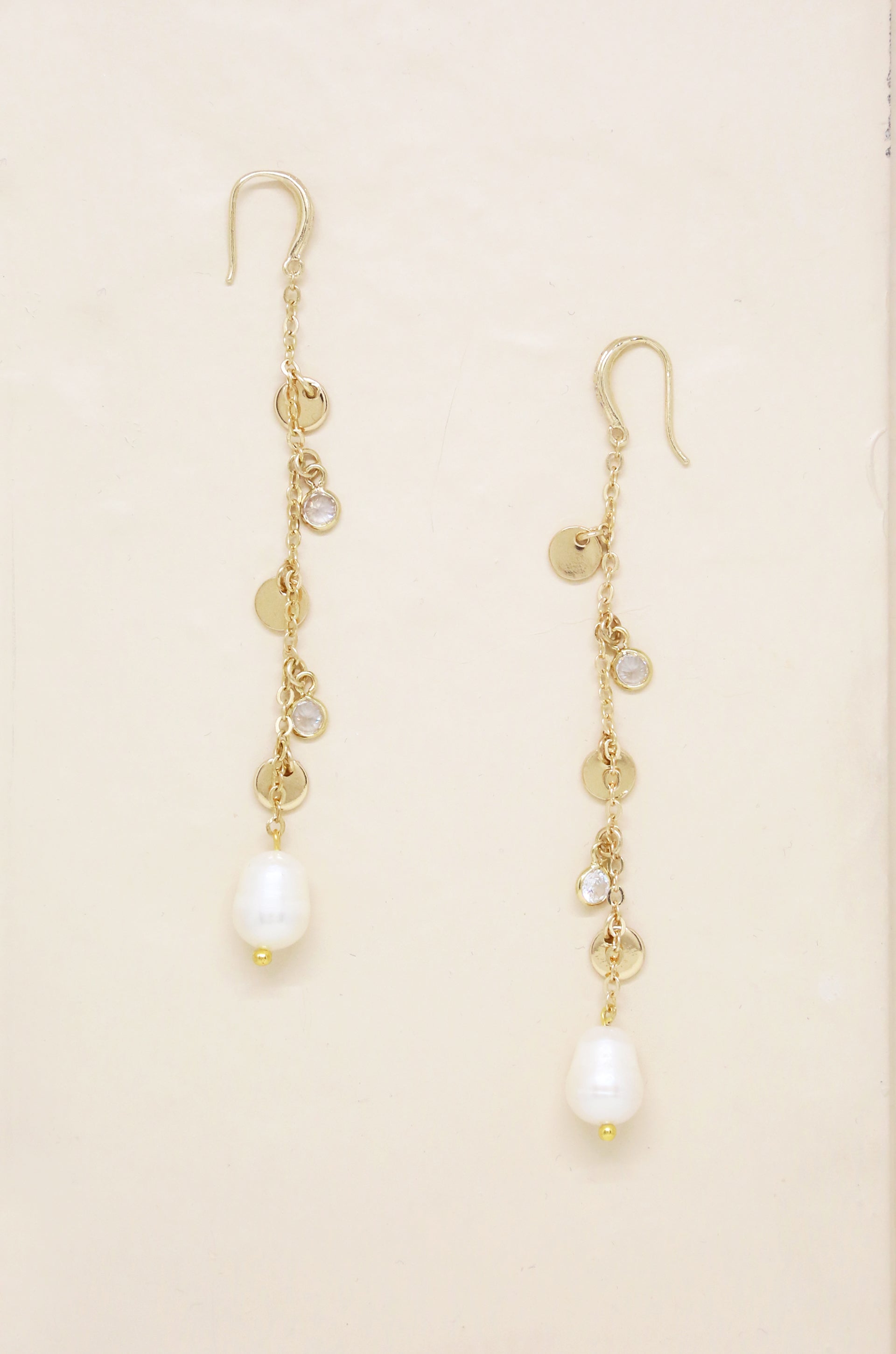 Delicate Dangle Freshwater Pearl 18k Gold Plated Earrings on slate background  