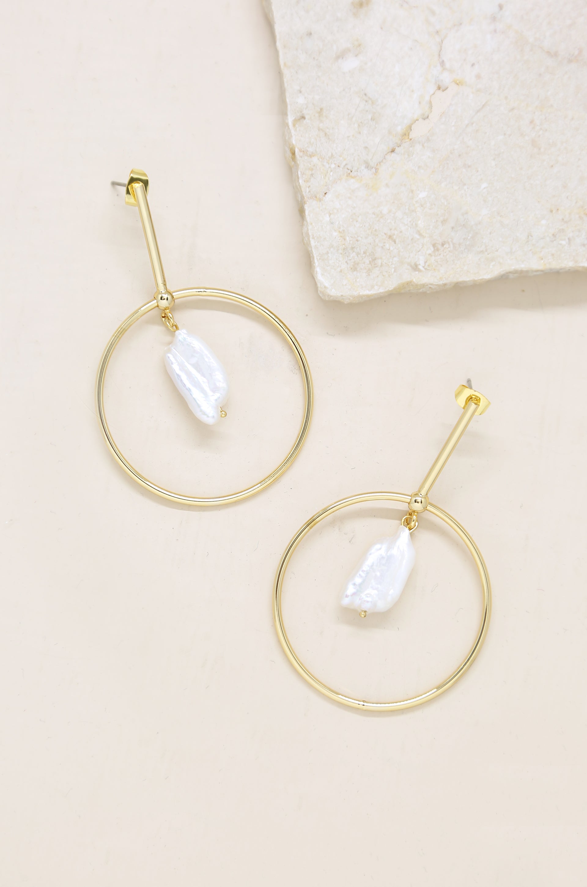 Modern 18k Gold Plated & Freshwater Pearl Drop Hoop Earrings on slate background  