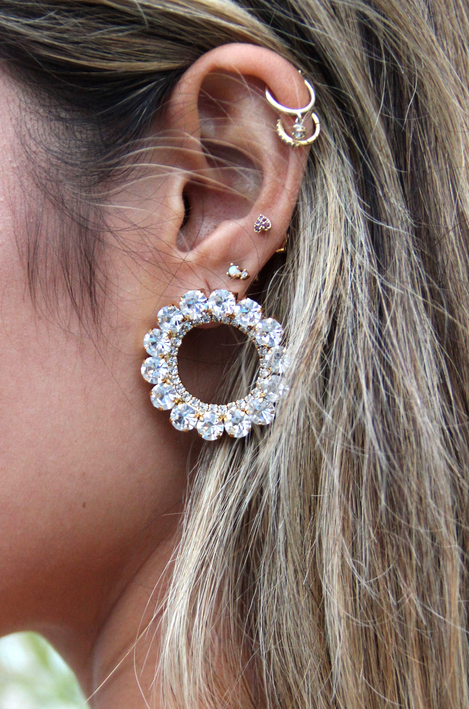 Large Crystal & 18k Gold Plated Circle Stud Earrings shown on a model  