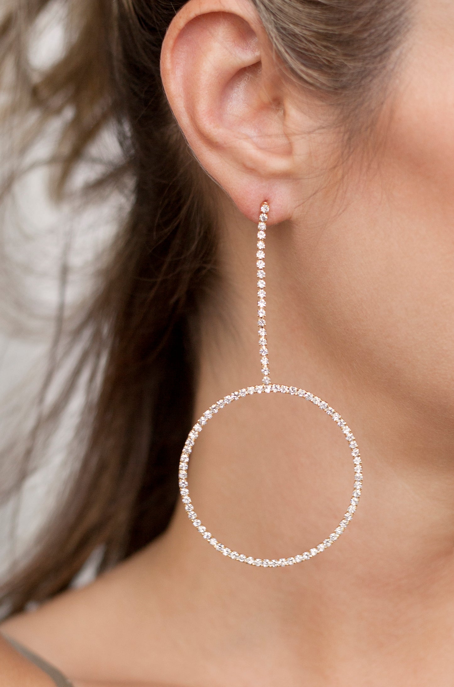 Crystal & 18k Gold Plated Linear Circle Drop Earrings shown on a model  