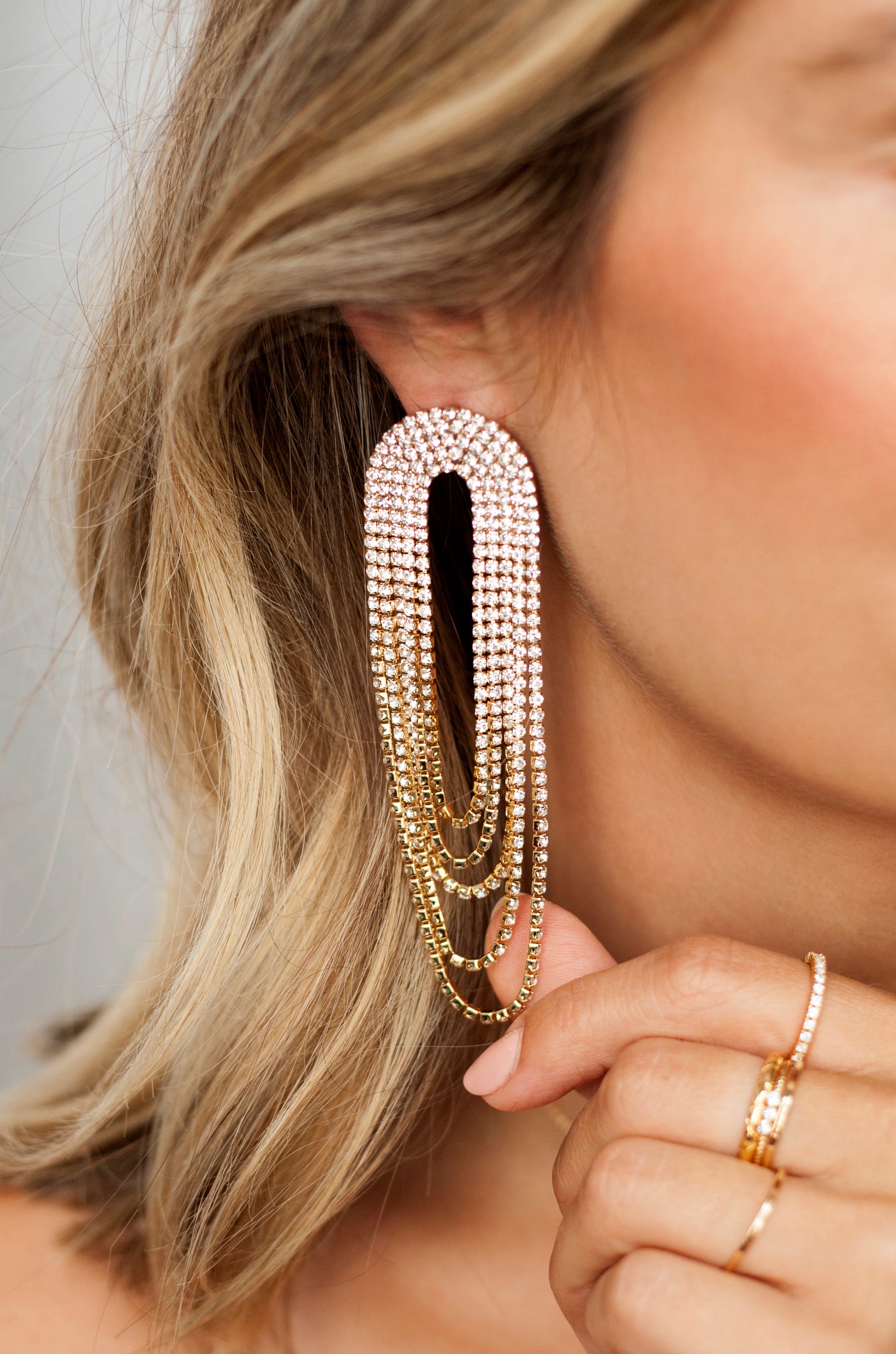 Crystal Drape Fringe Earrings shown on model  