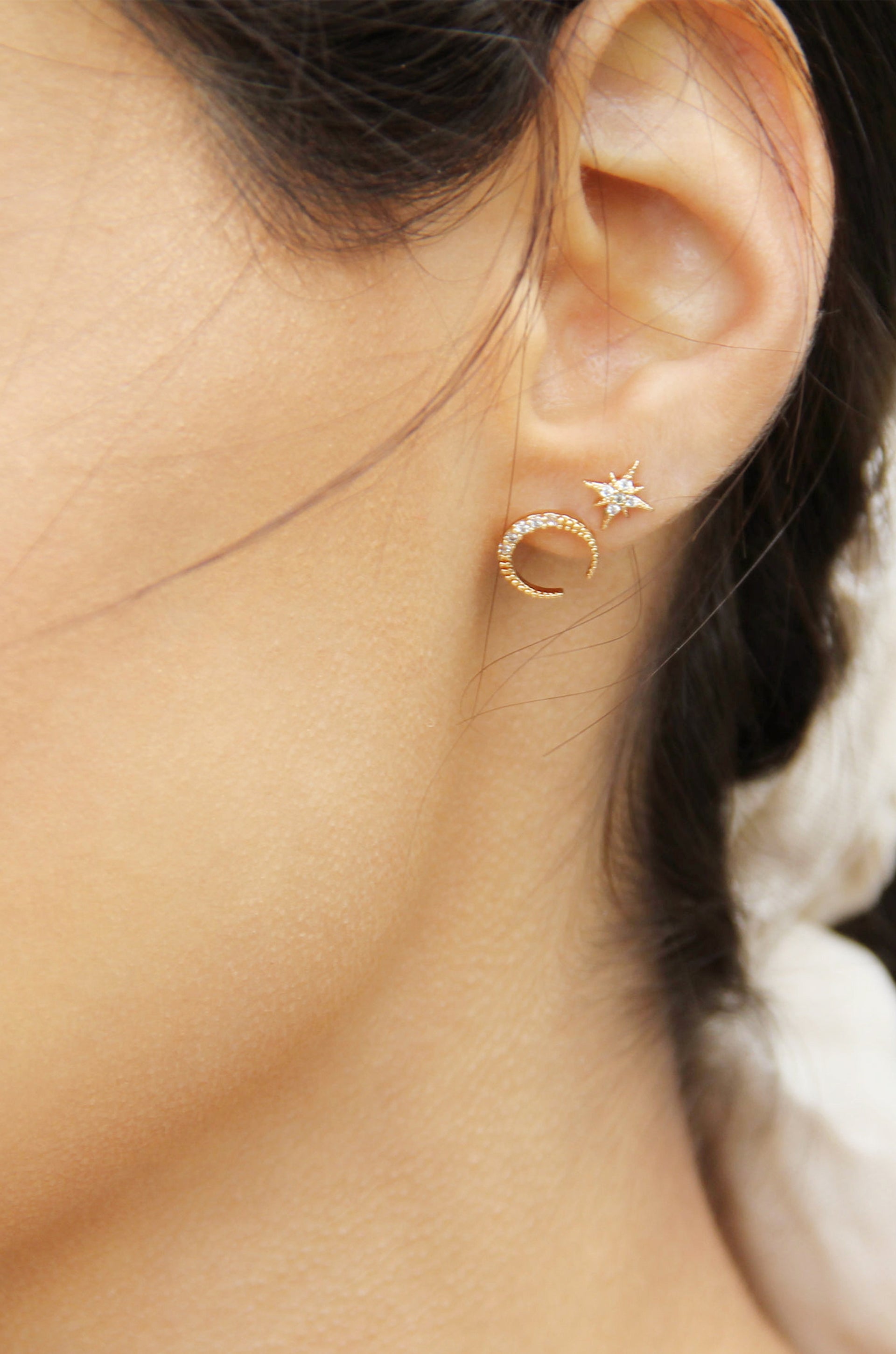 Crystal Interstellar Earring Studs shown on a model  
