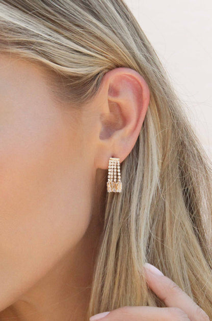 Crystal Fringe 18k Gold Plated Dangle Stud Earrings shown on a model  