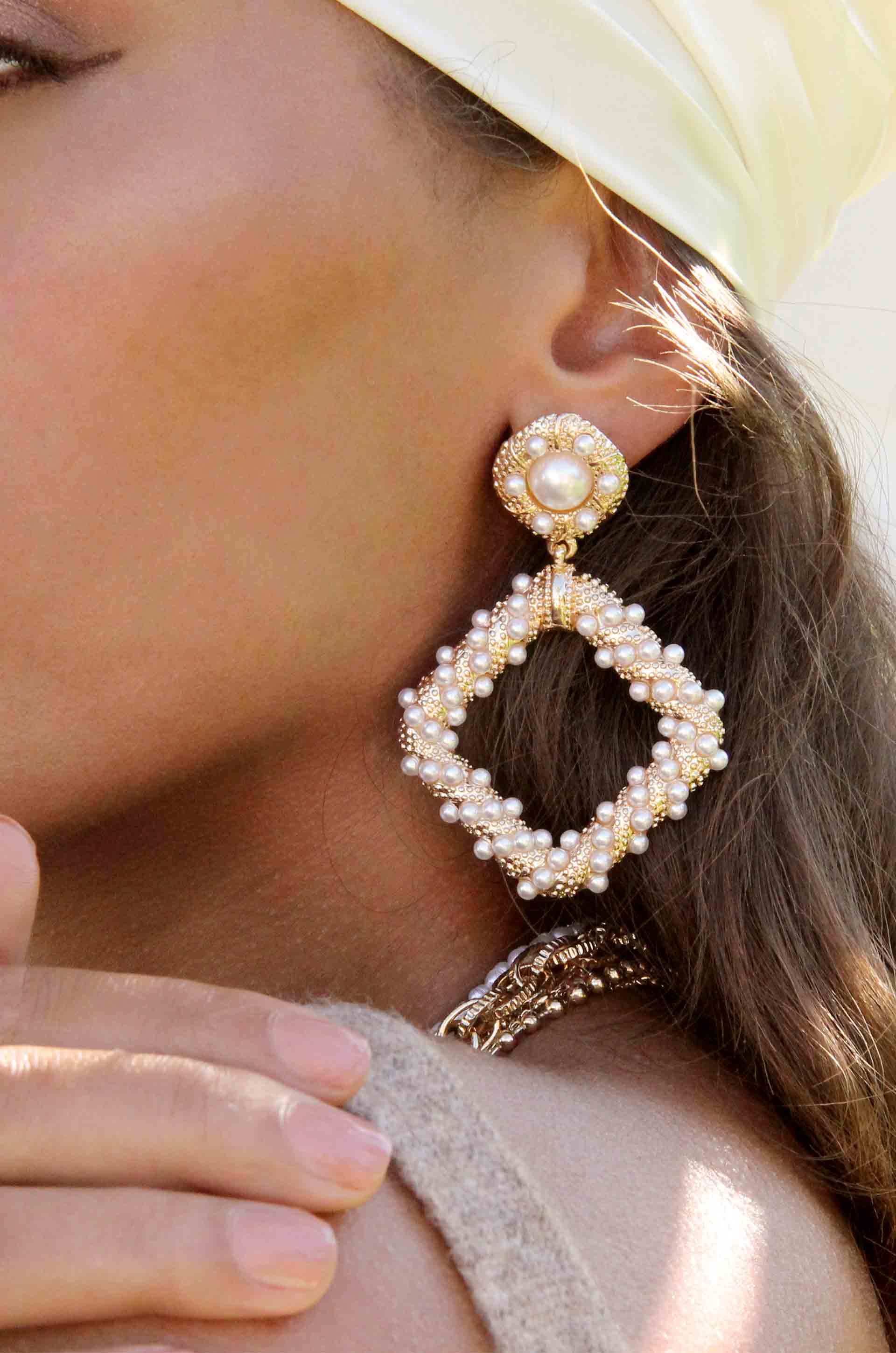 Pearl Knocker 18k Gold Plated Earrings shown on a model  