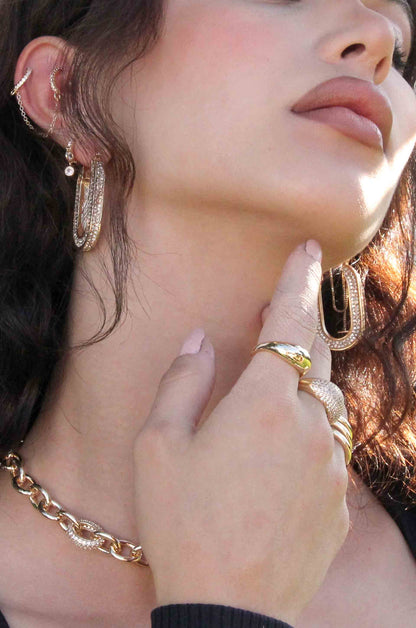 Crystal Spotlight 18k Gold Plated Hoops shown on a model  