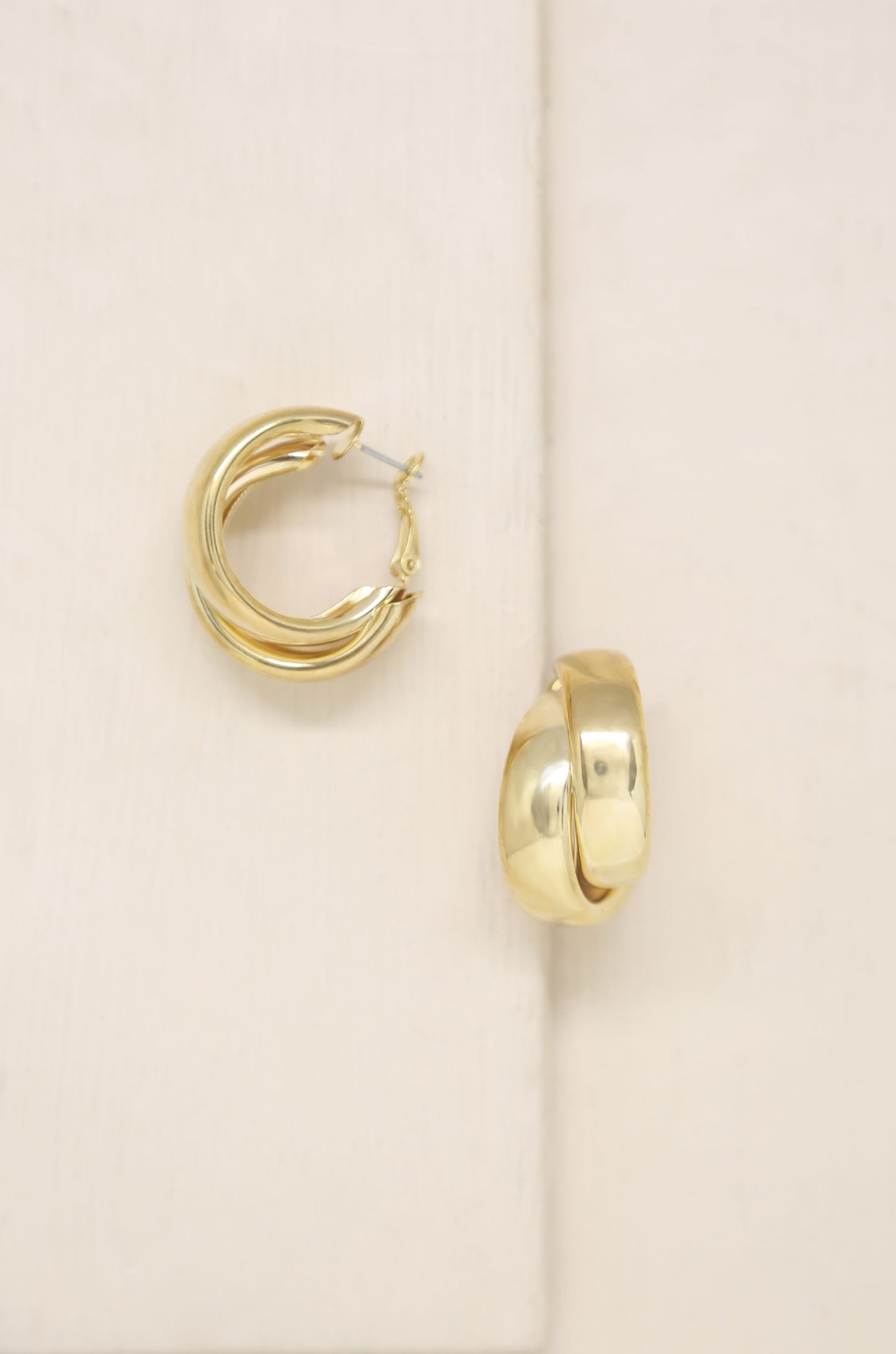Necessary Accessory 18k Gold Plated Hoop Earrings on slate background  
