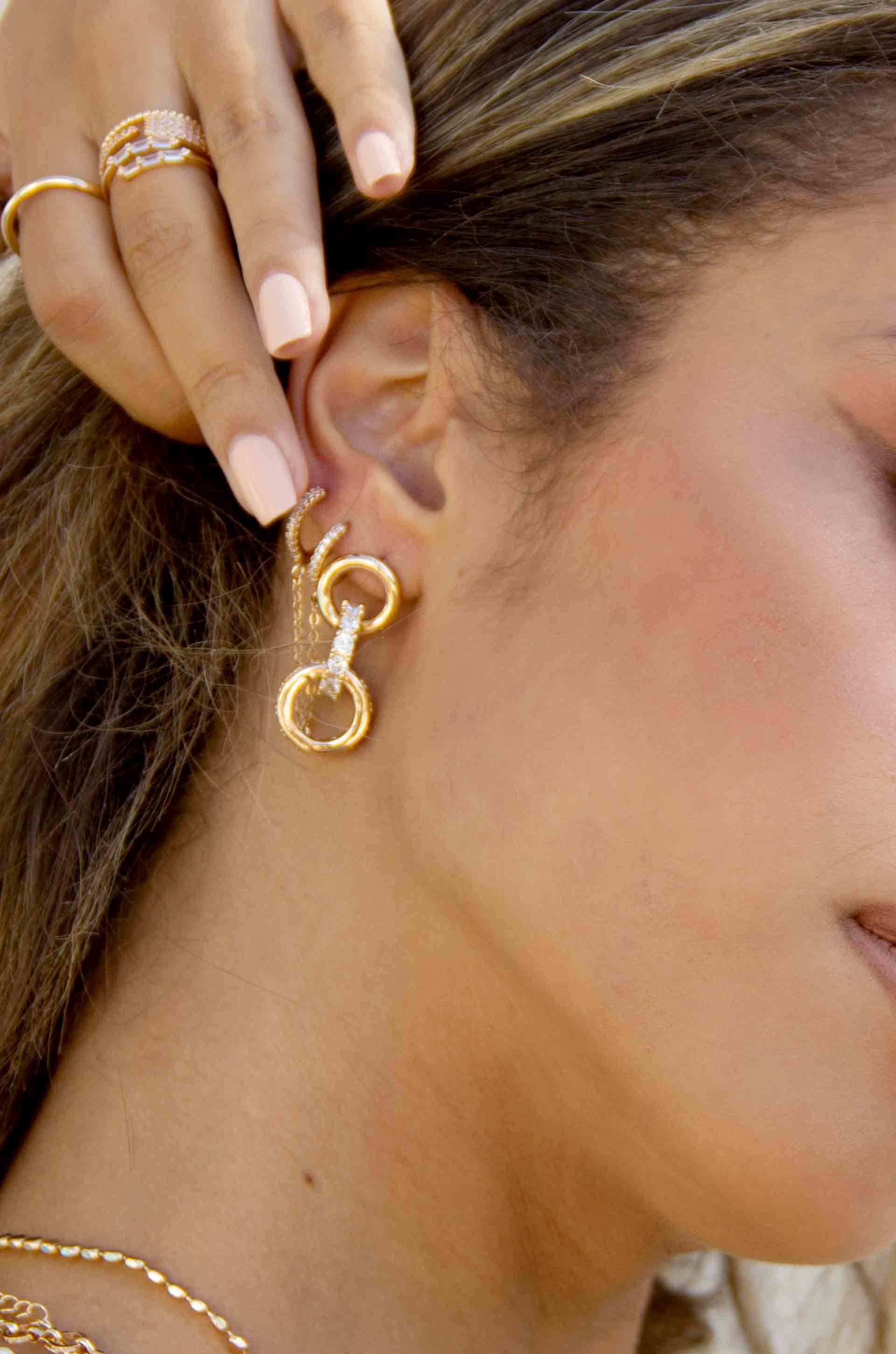 Elegant Baby 18k Gold Plated Crystal Dangle Earrings on a model