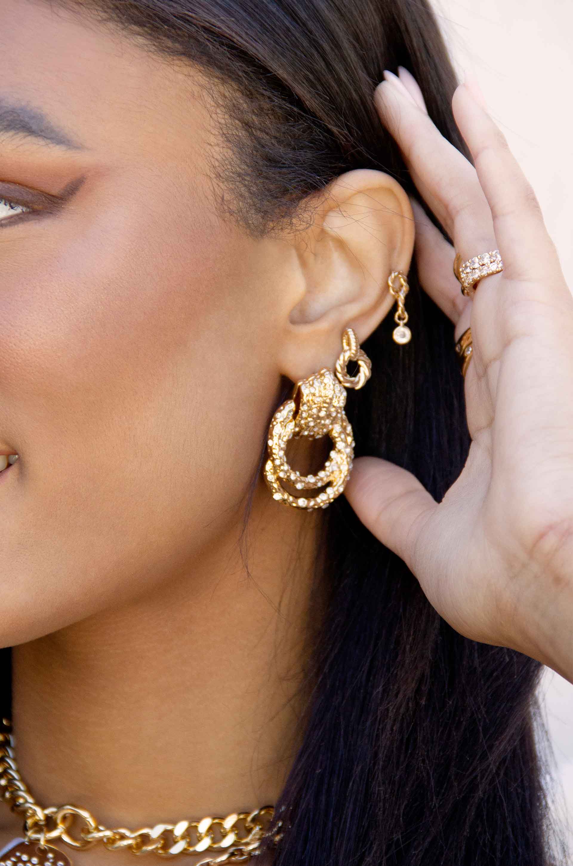 Only Royalty 18k Gold Plated Crystal Earrings on a model