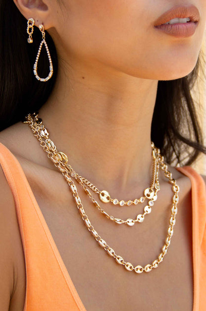 Angels City Drop Crystal 18k Gold Plated Earrings on a model