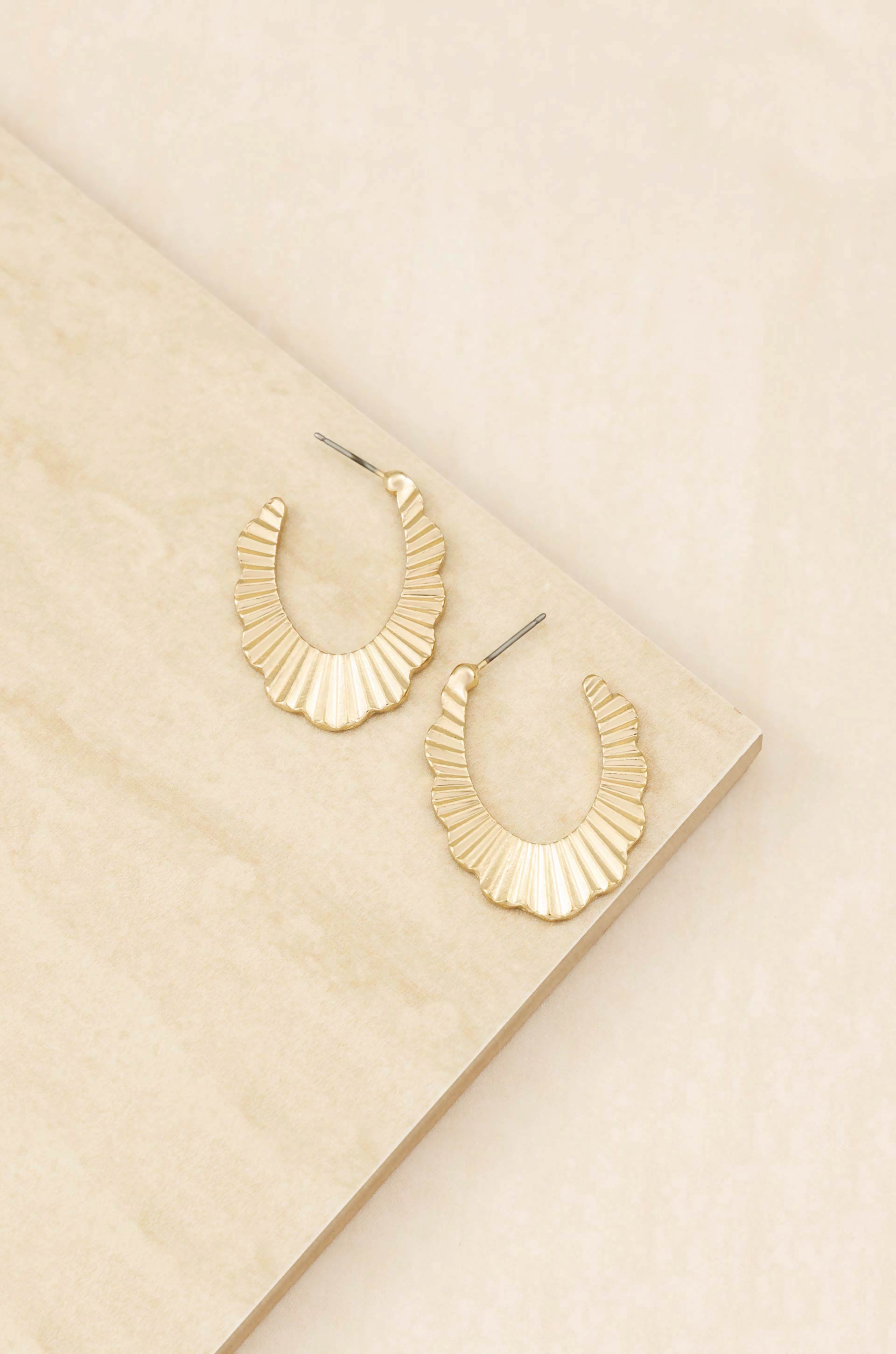 Textured Relics 18k Gold Plated Hoop Earrings on slate background