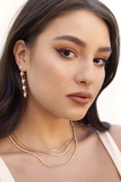 Starburst Crystal Chain Dangle 18k Gold Plated Earrings on model