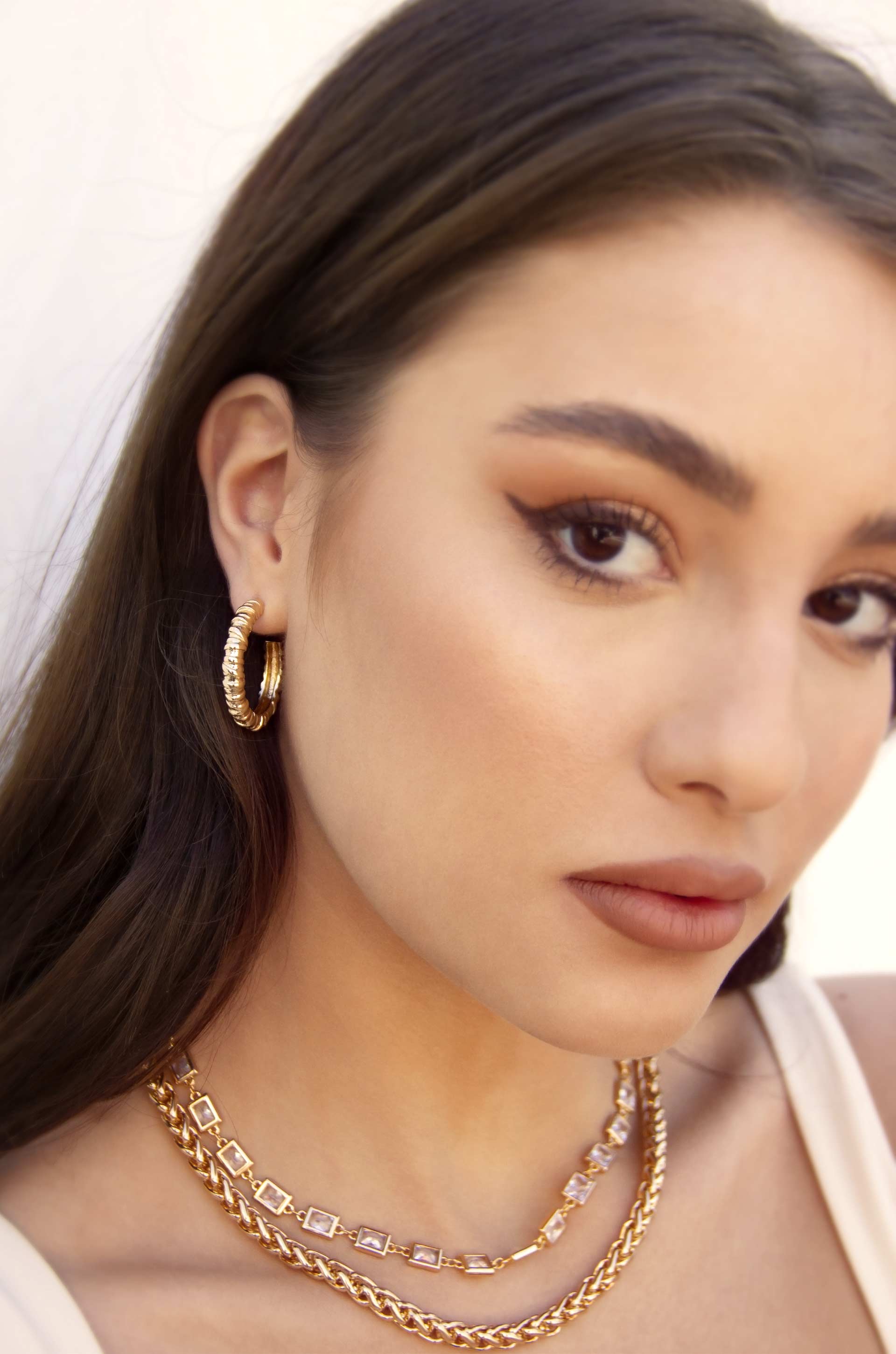 Athena Mini Textured 18k Gold Plated Hoop Earrings on model