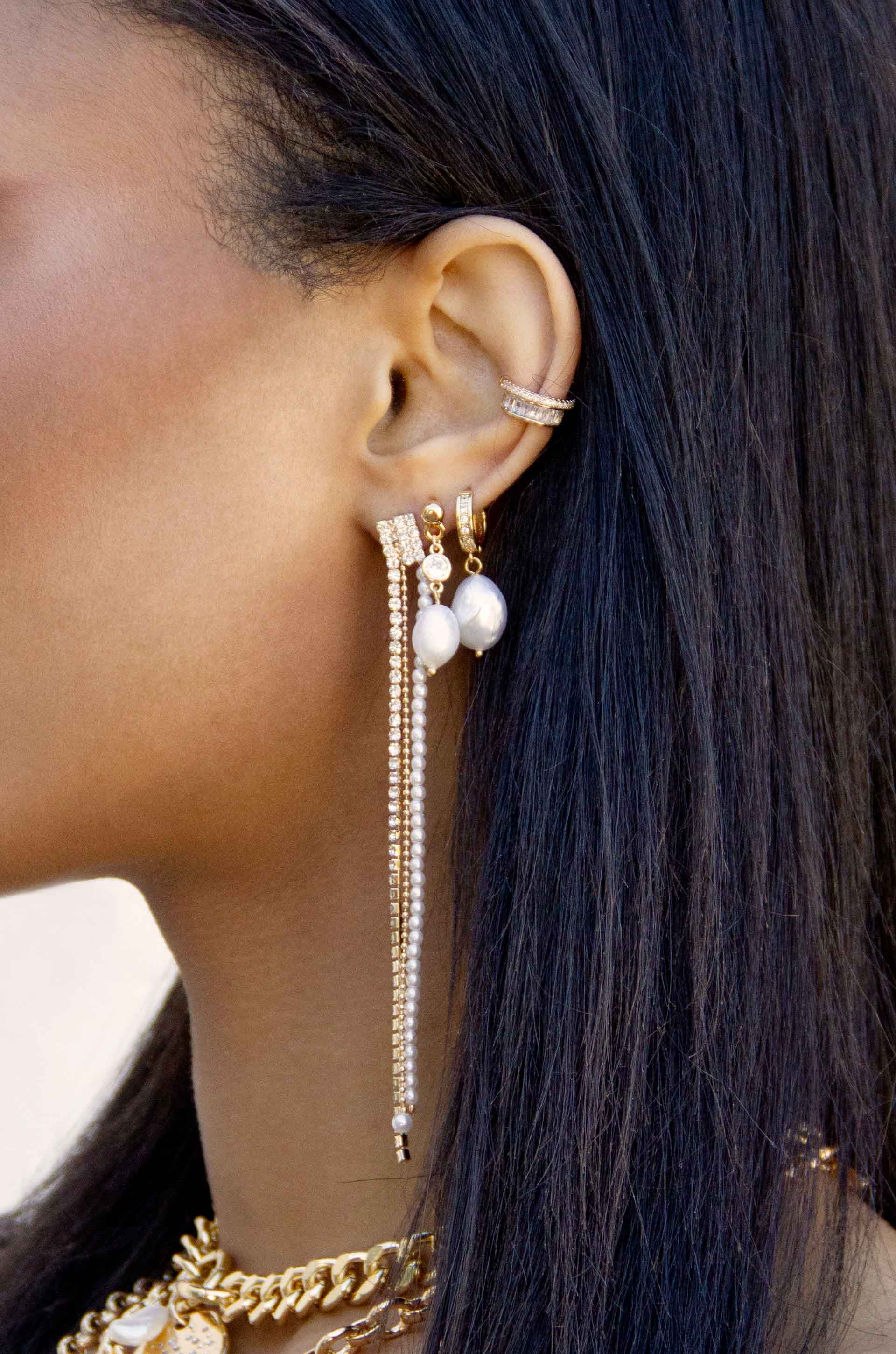 Fireworks Crystal Dangle 18k Gold Plated Earrings on a model