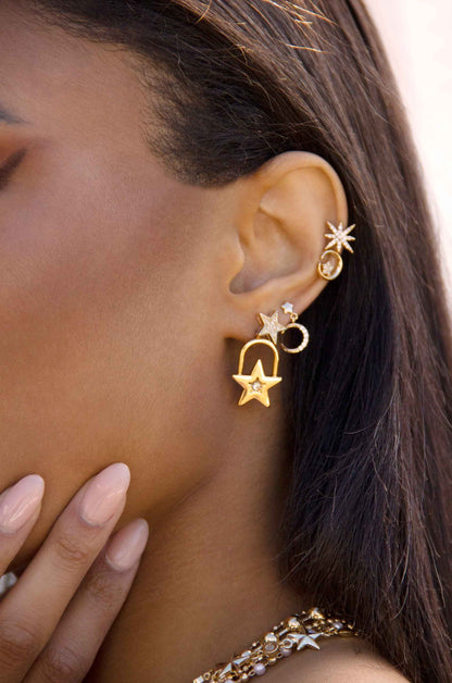 Star Power 18k Gold Plated Earrings on a model