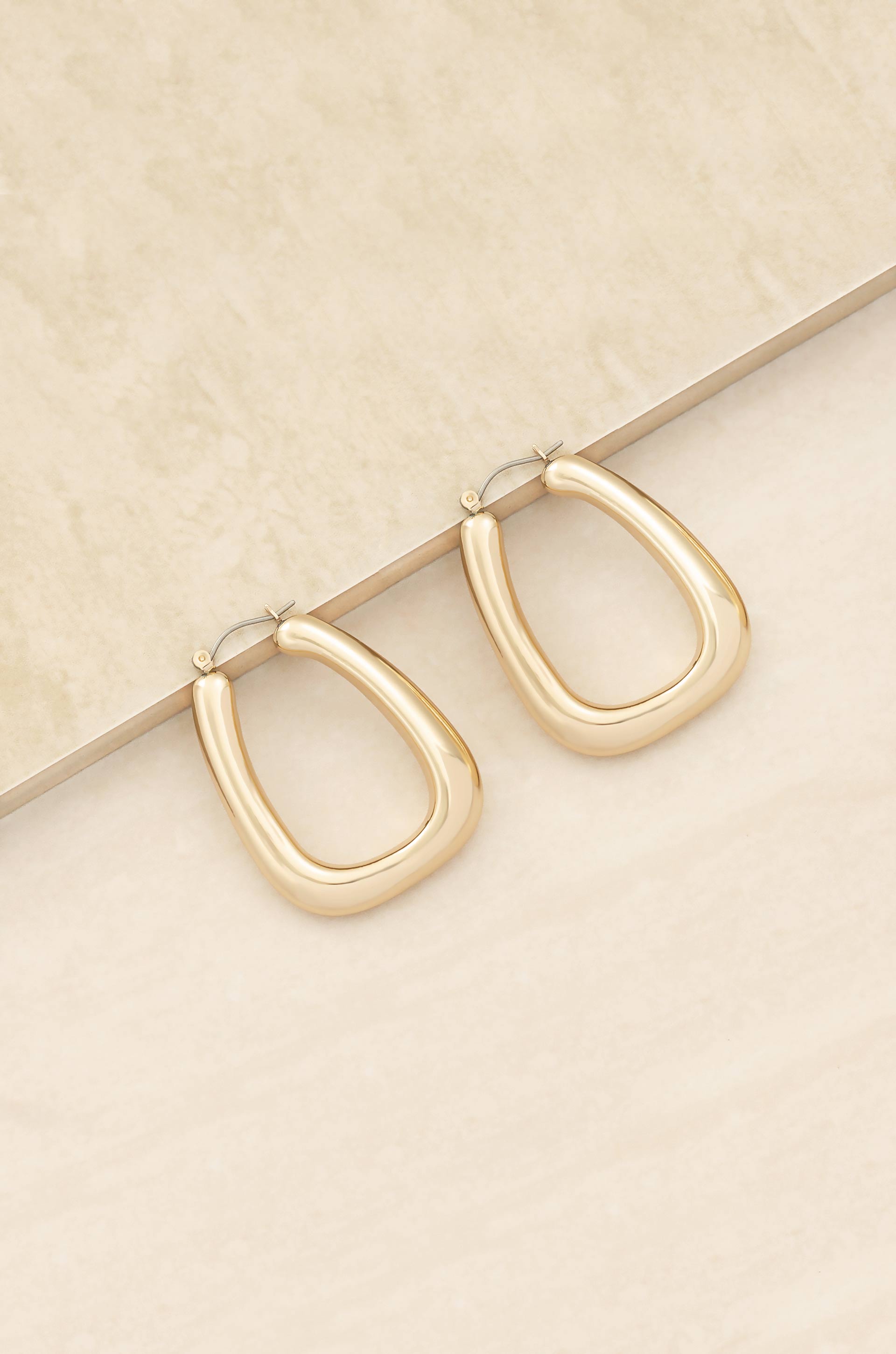 Everyday Boss 18k Gold Plated Hoop Earrings on slate background