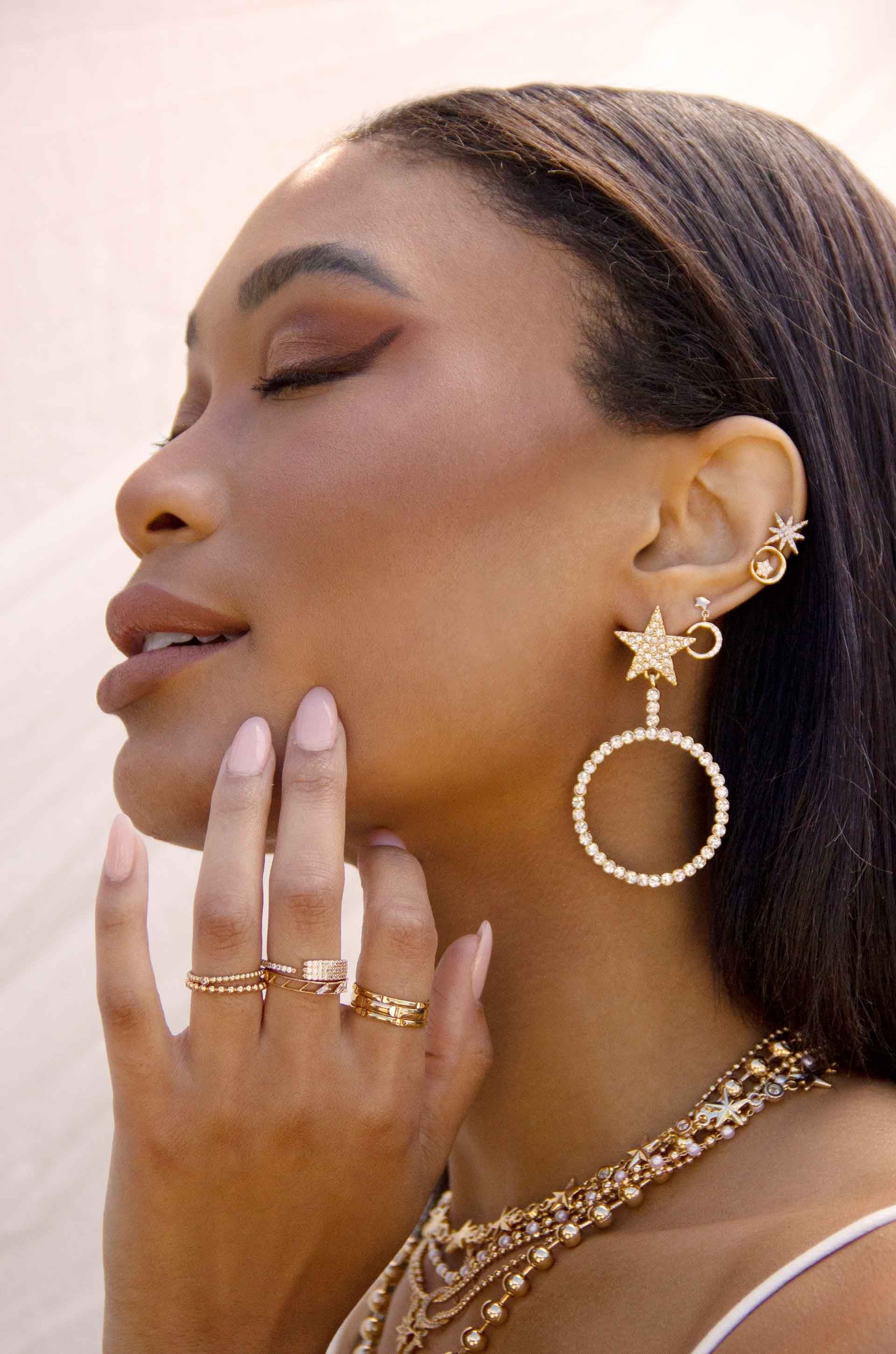 Spotlight Starlight 18k Gold Plated Crystal Earrings on a model