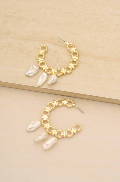 Chunky 18k Gold Plated Hoops with Freshwater Pearl Charms on a slate backgroud