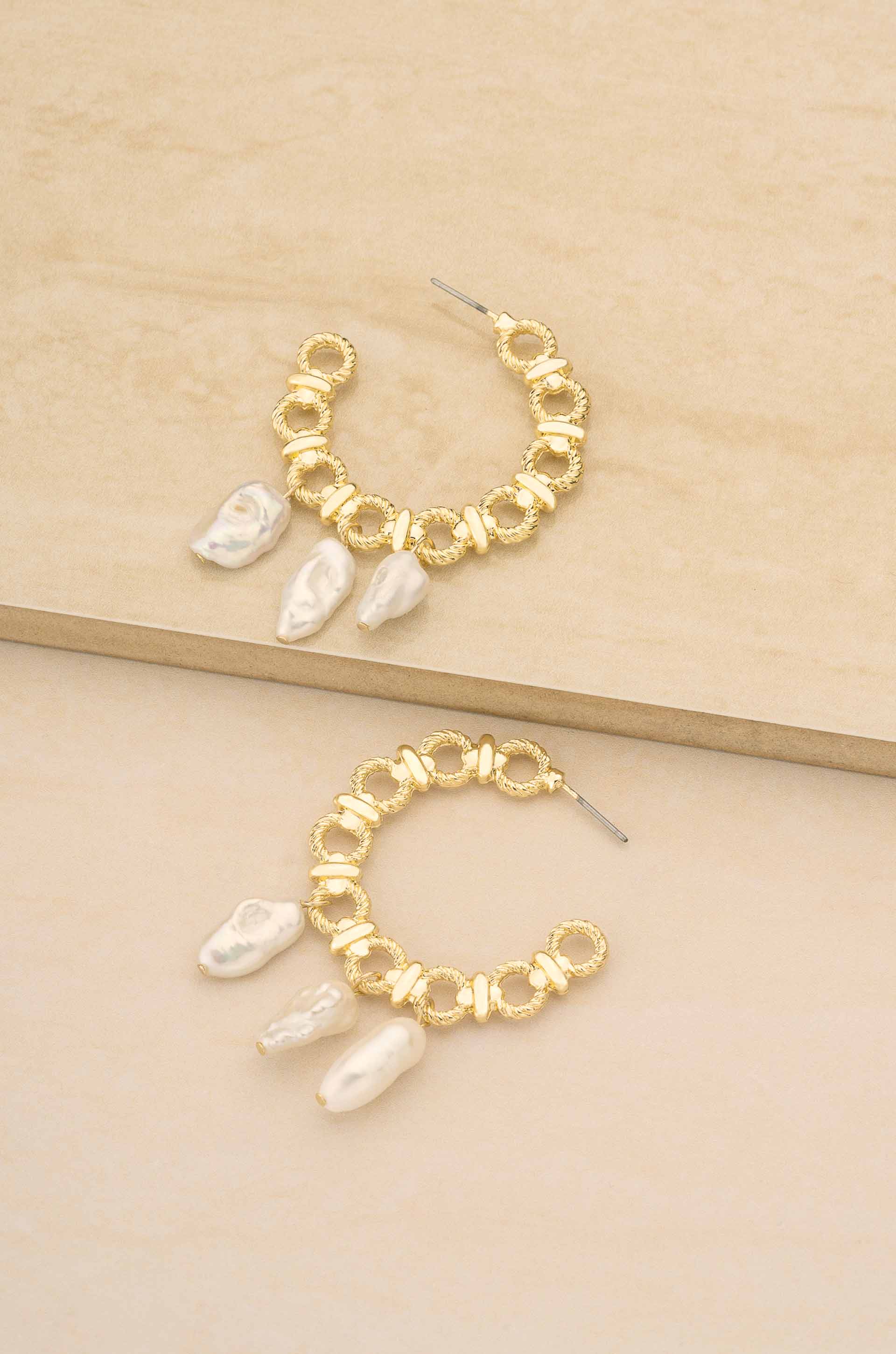 Chunky 18k Gold Plated Hoops with Freshwater Pearl Charms on a slate backgroud