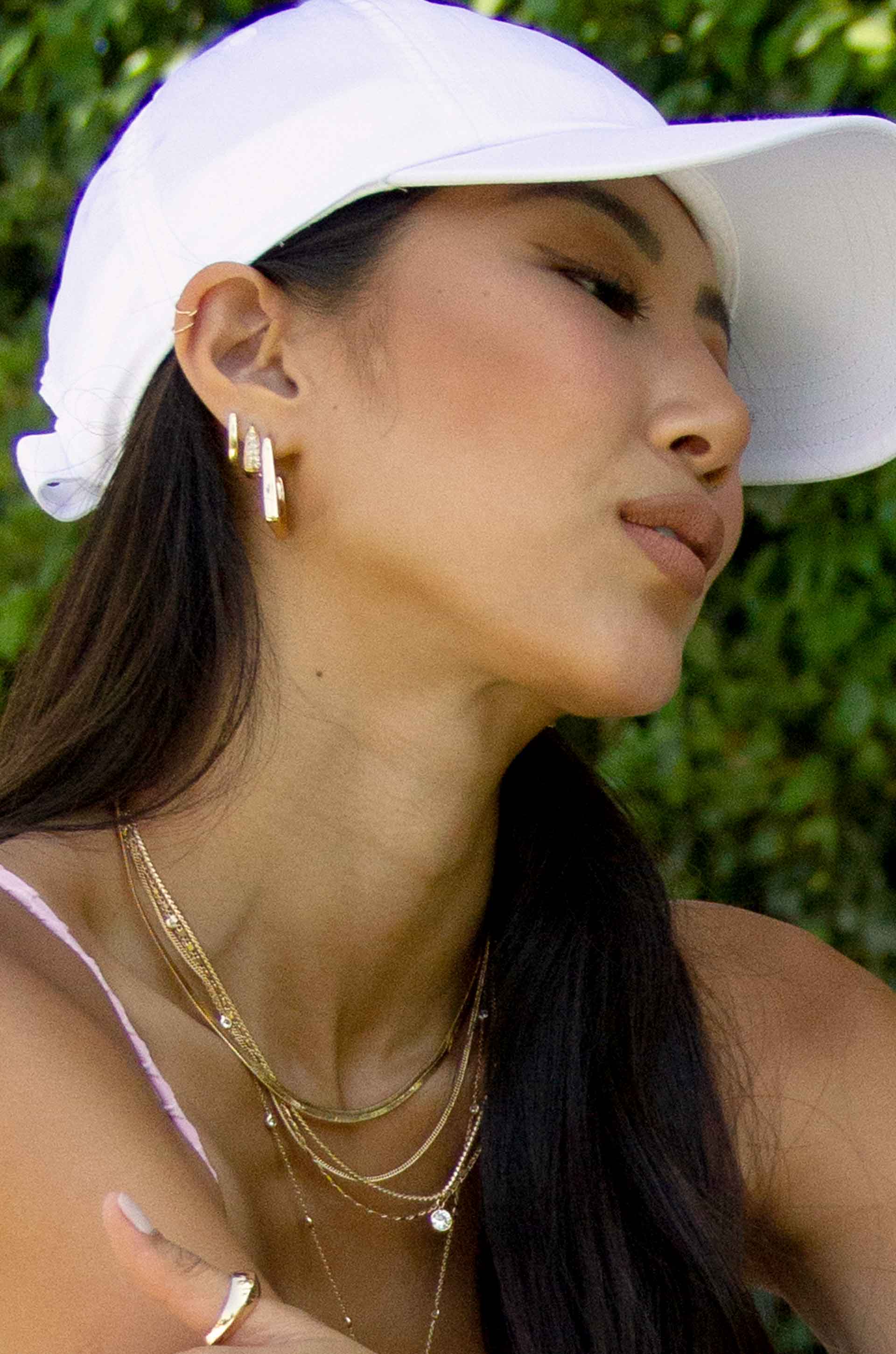 Small Darling Crystal 18k Gold Plated Hoops on a model
