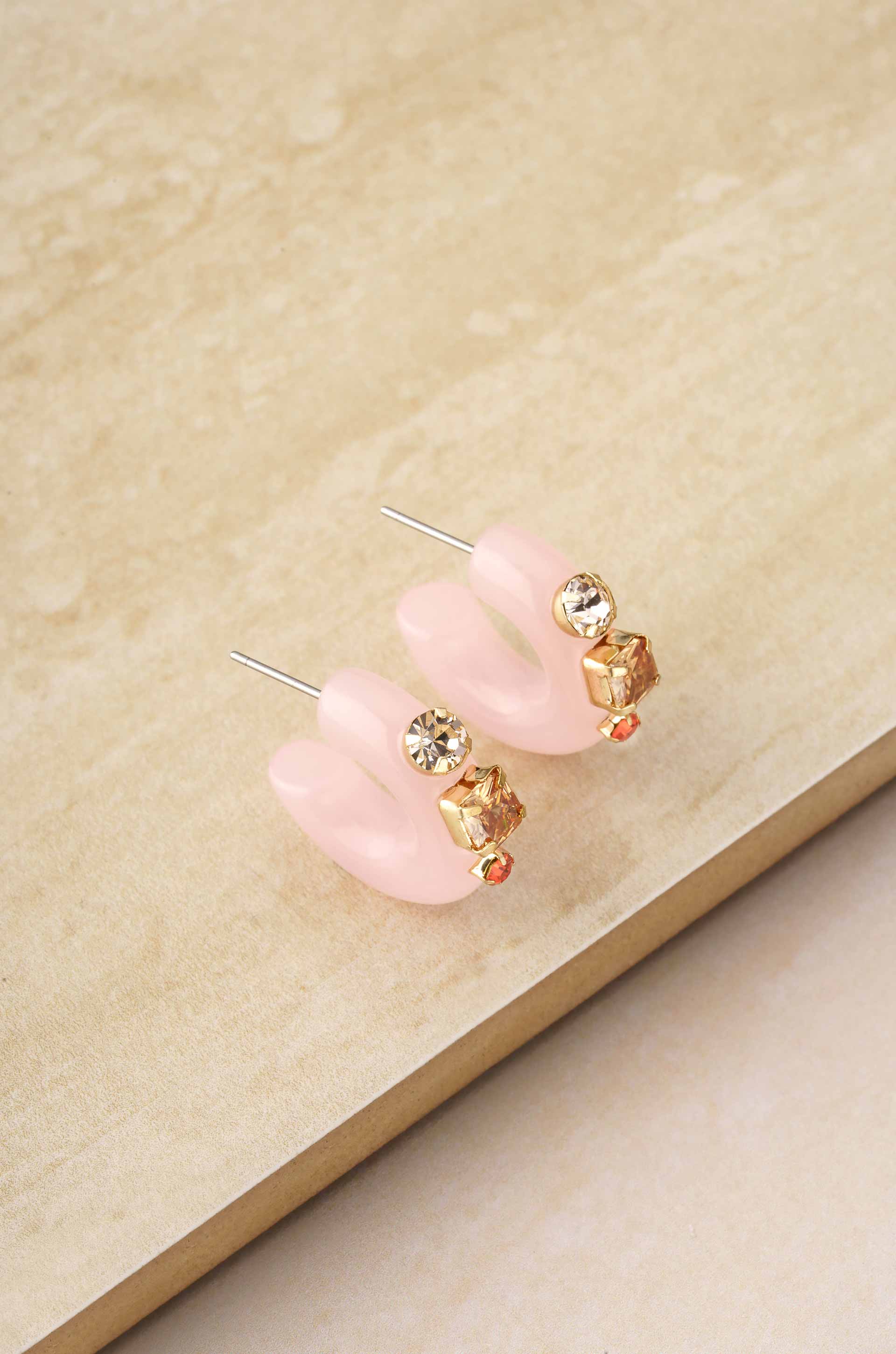 Cloud Pink Resin Hoop Earrings on slate background